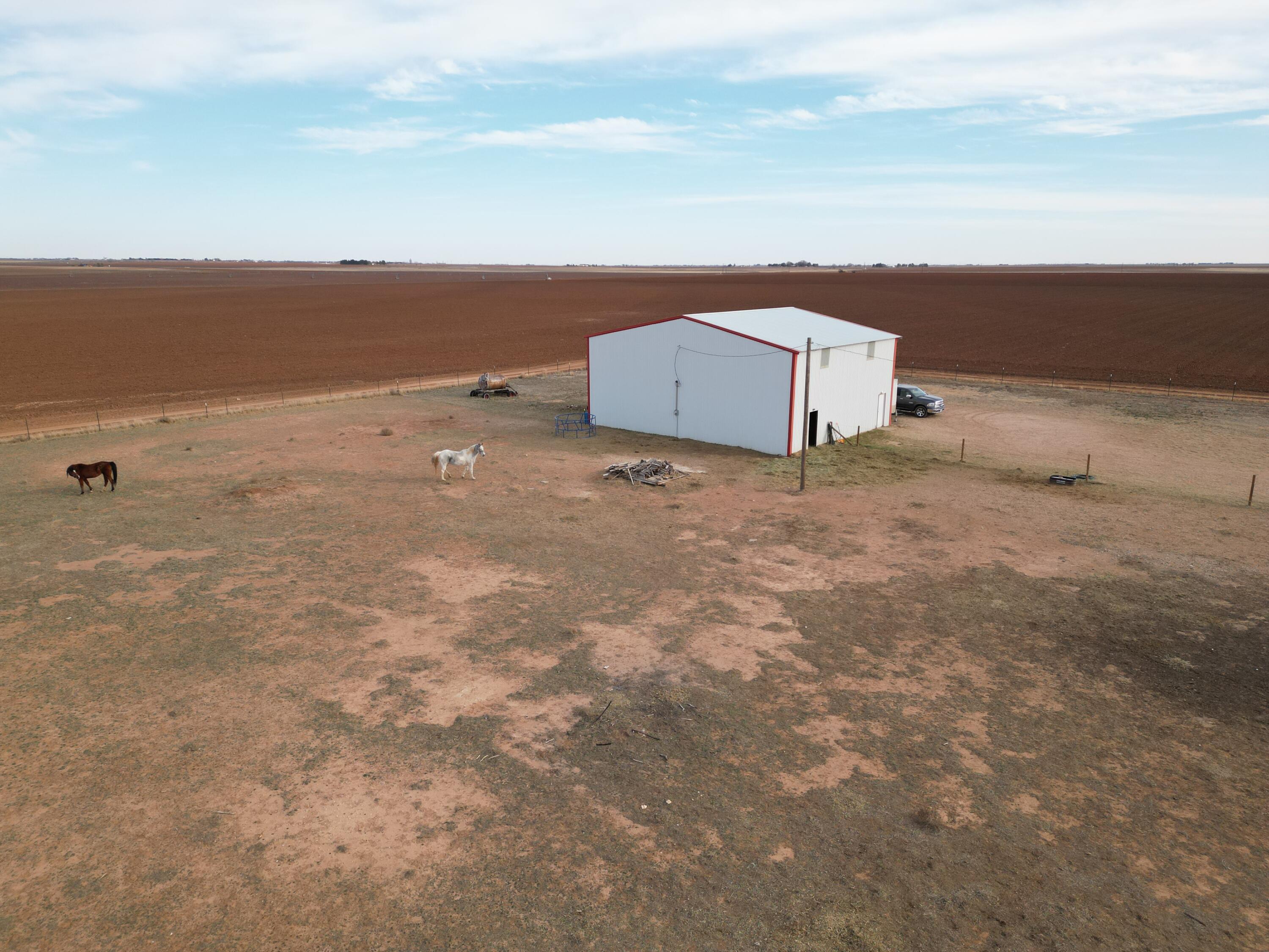 3725 Hawk Road Ropesville, TX 79358 - Photo 36 of 39 a view of a dry yard with wooden fence
