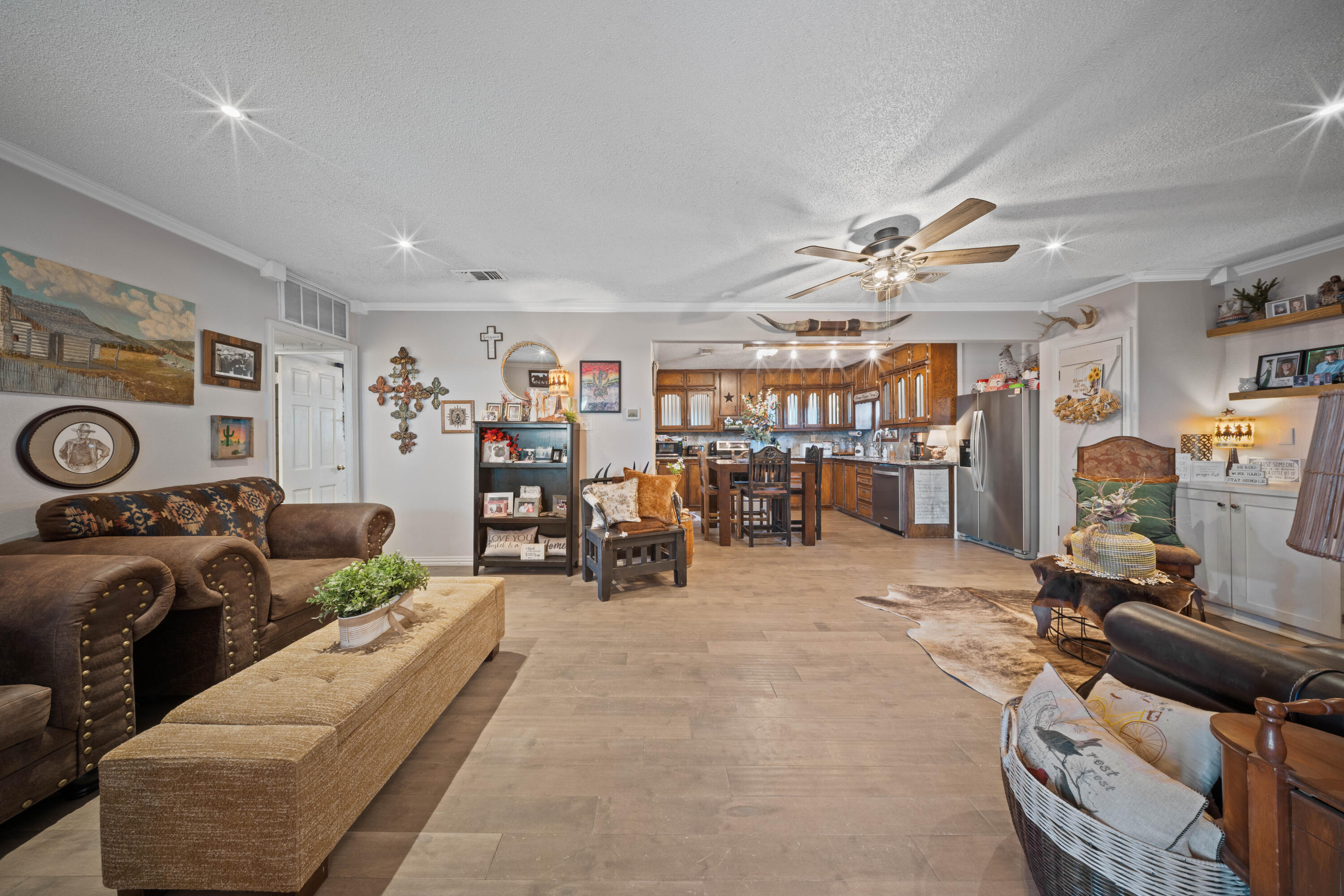 3725 Hawk Road Ropesville, TX 79358 - Photo 7 of 39 a view of a room with furniture and a tv