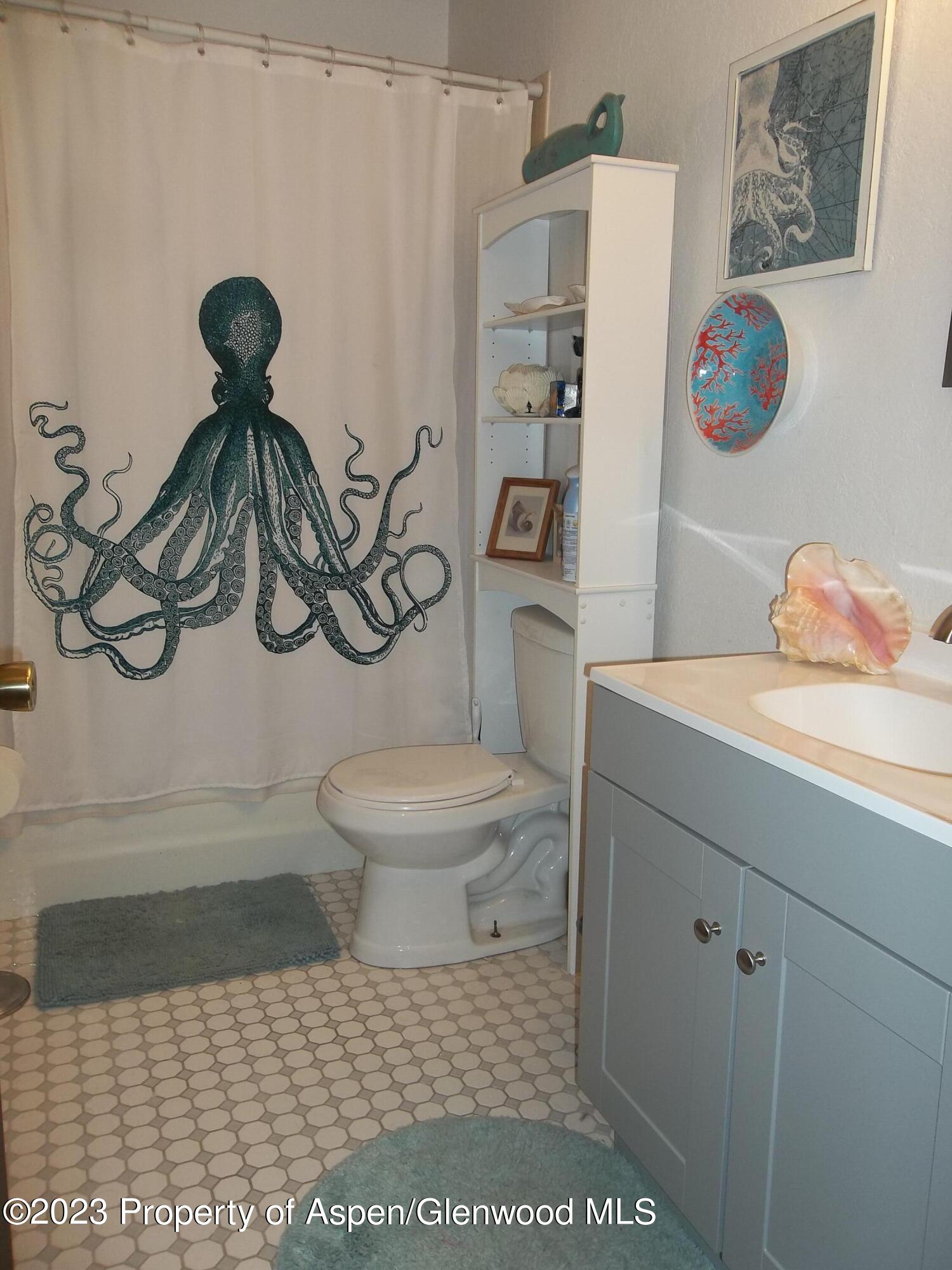 500 Wamsley Way Rifle, CO 81650 - Photo 7 of 21 a bathroom with a toilet and a shower