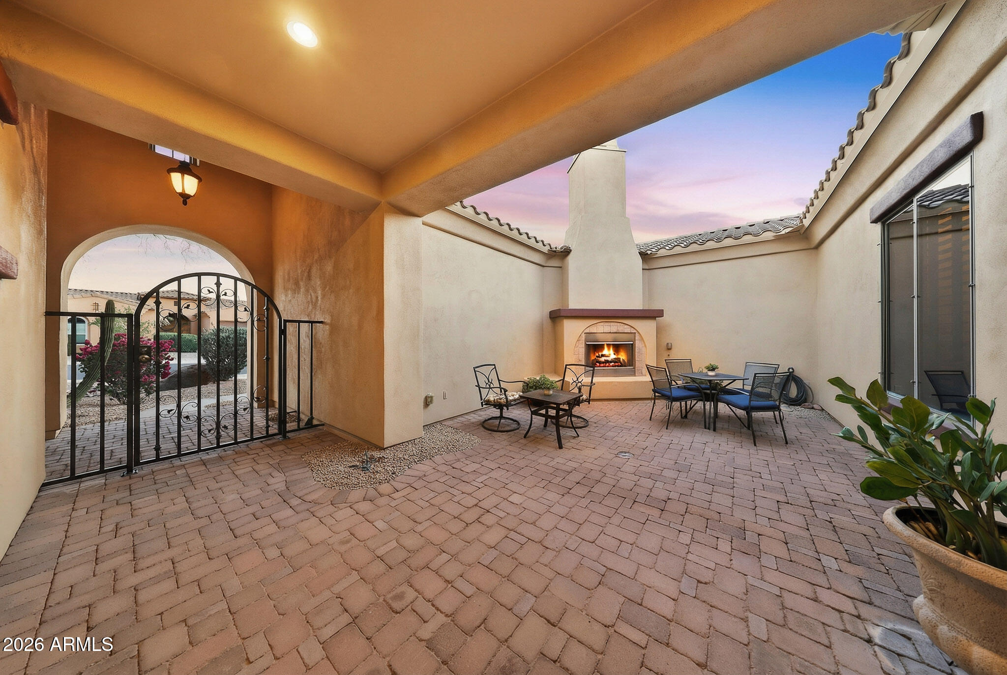 18174 West Narramore Road Goodyear, AZ 85338 - Photo 9 of 35 Fireplace in Courtyard