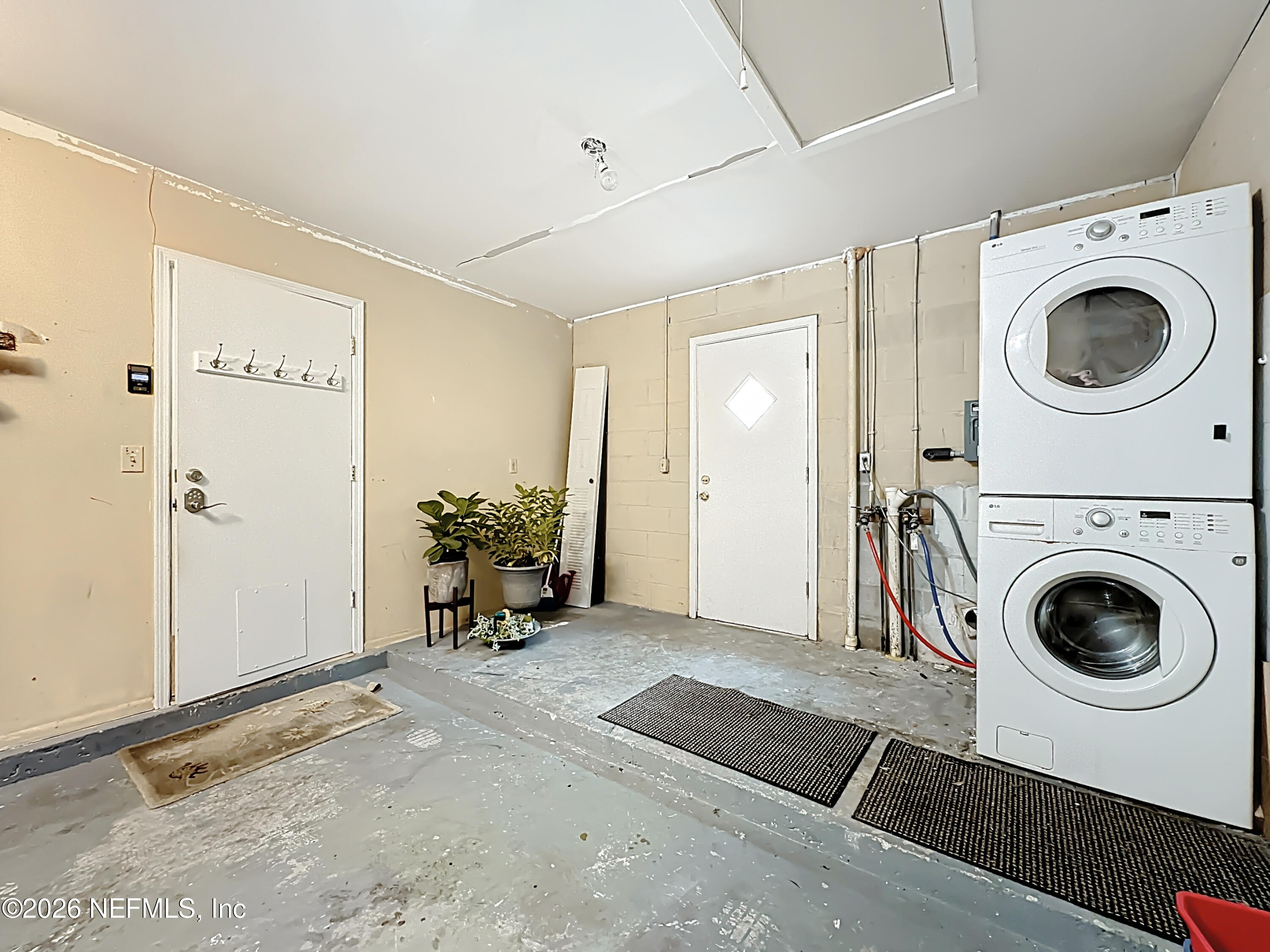 3410 Ricky Court Jacksonville, FL 32223 - Photo 28 of 37 a view of a storage & utility room with washer and dryer
