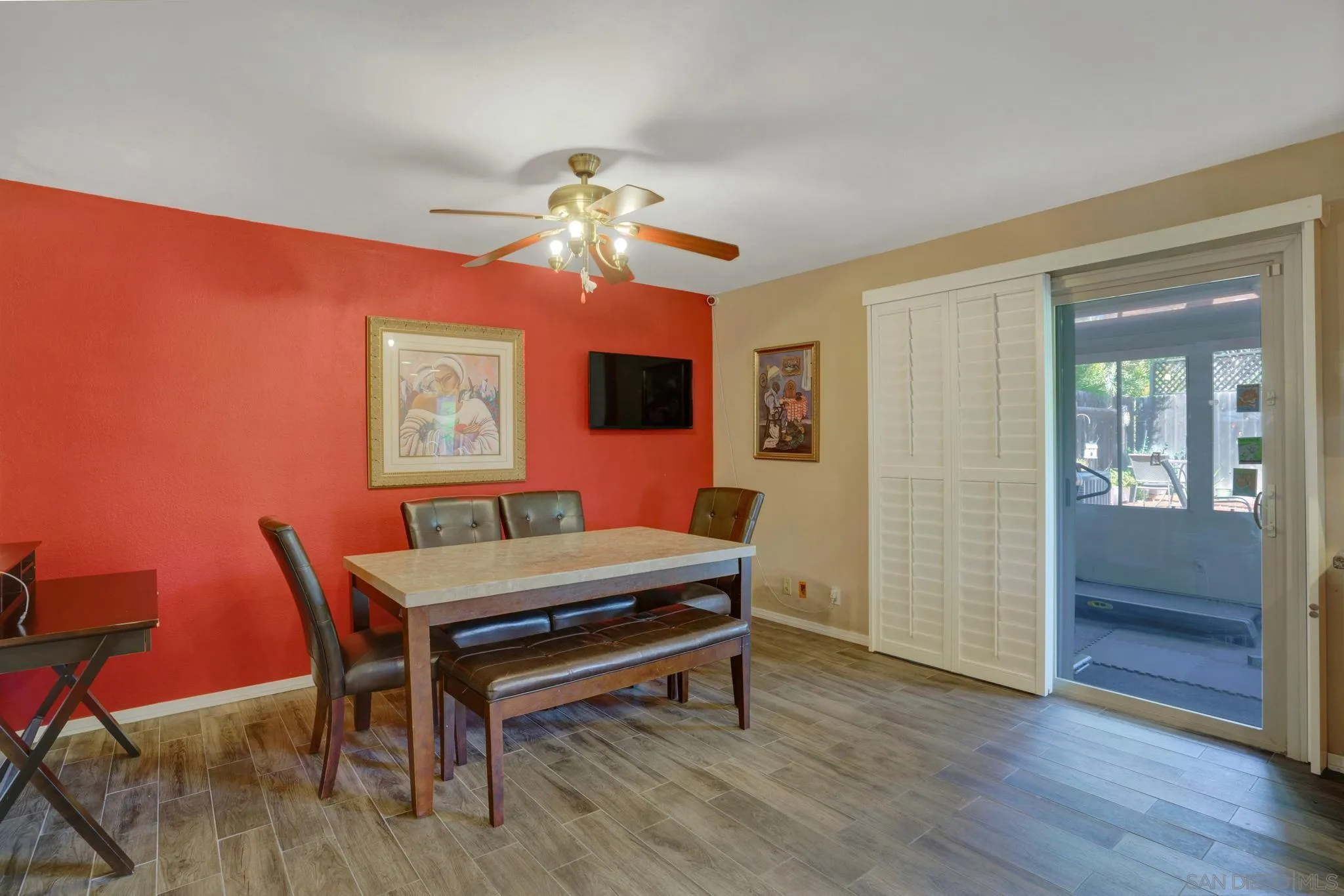 3006 Gayla Court Spring Valley, CA 91978 - Photo 18 of 39 a room with a table chairs and wooden floor