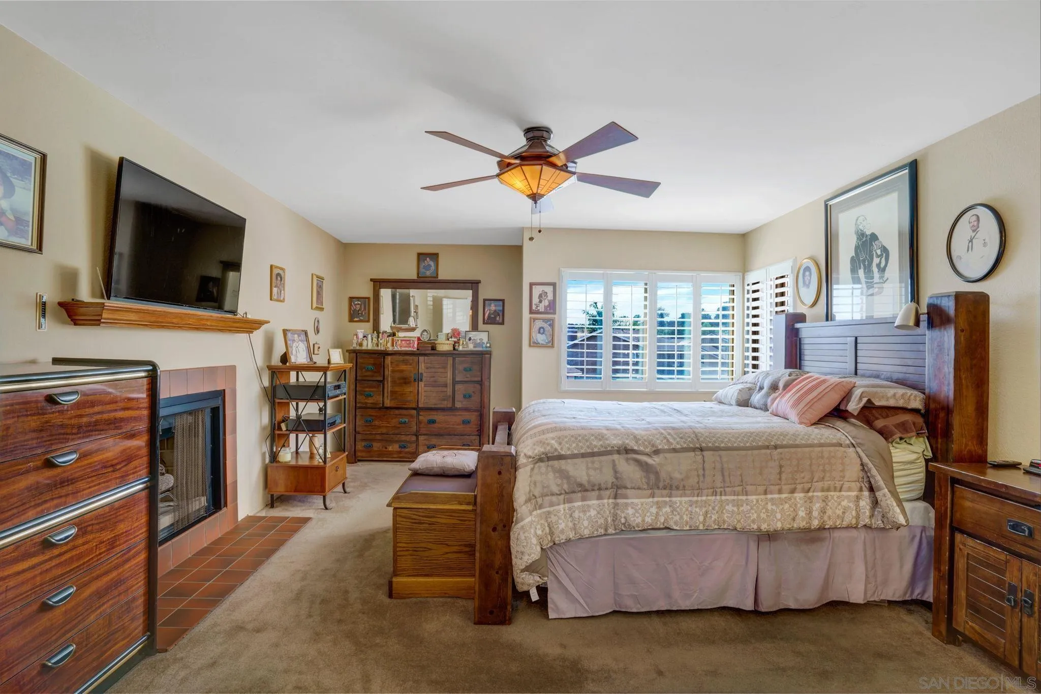 3006 Gayla Court Spring Valley, CA 91978 - Photo 21 of 39 a bedroom with a bed and a flat screen tv