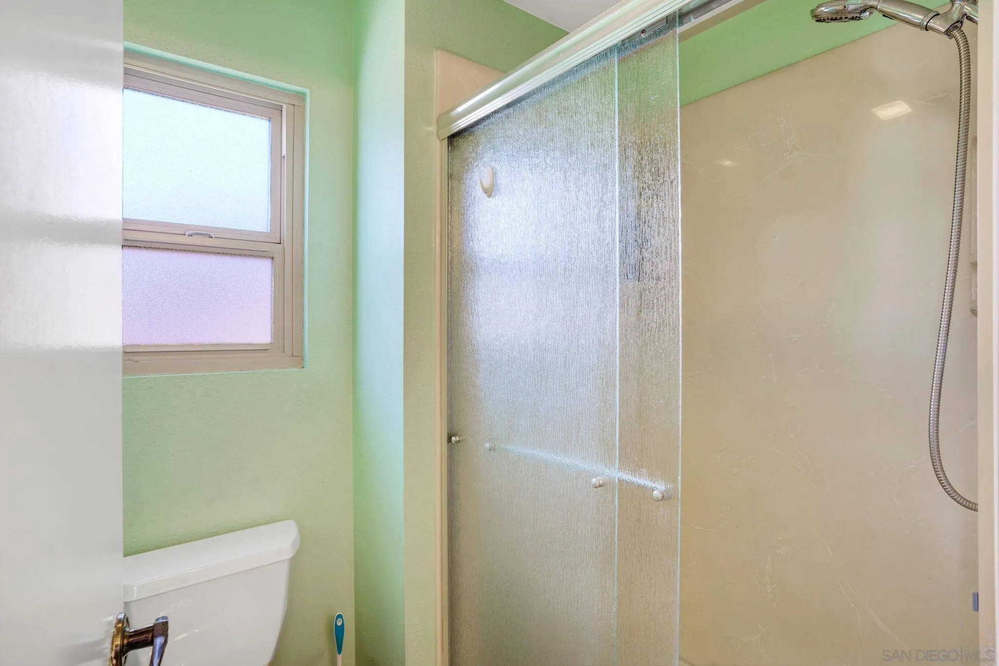 3006 Gayla Court Spring Valley, CA 91978 - Photo 23 of 39 a bathroom with a shower and a toilet