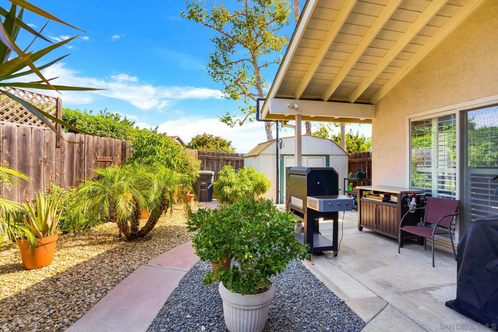 3006 Gayla Court Spring Valley, CA 91978 - Photo 28 of 39 a building outdoor space with patio furniture and potted plants