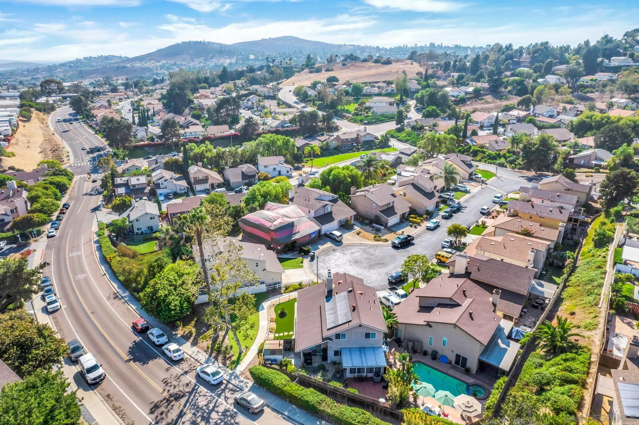 3006 Gayla Court Spring Valley, CA 91978 - Photo 37 of 39 an aerial view of residential houses with outdoor space and parking