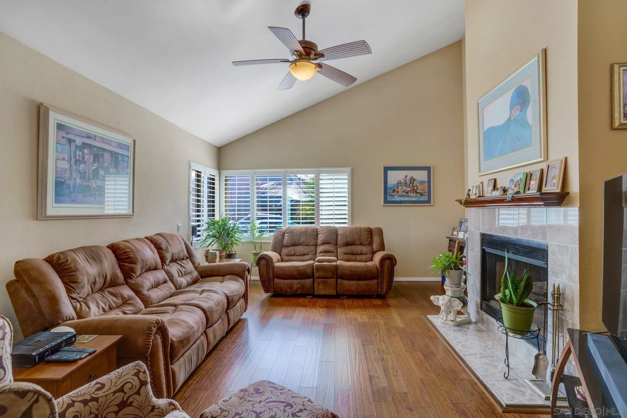 3006 Gayla Court Spring Valley, CA 91978 - Photo 6 of 39 a living room with furniture and a fireplace