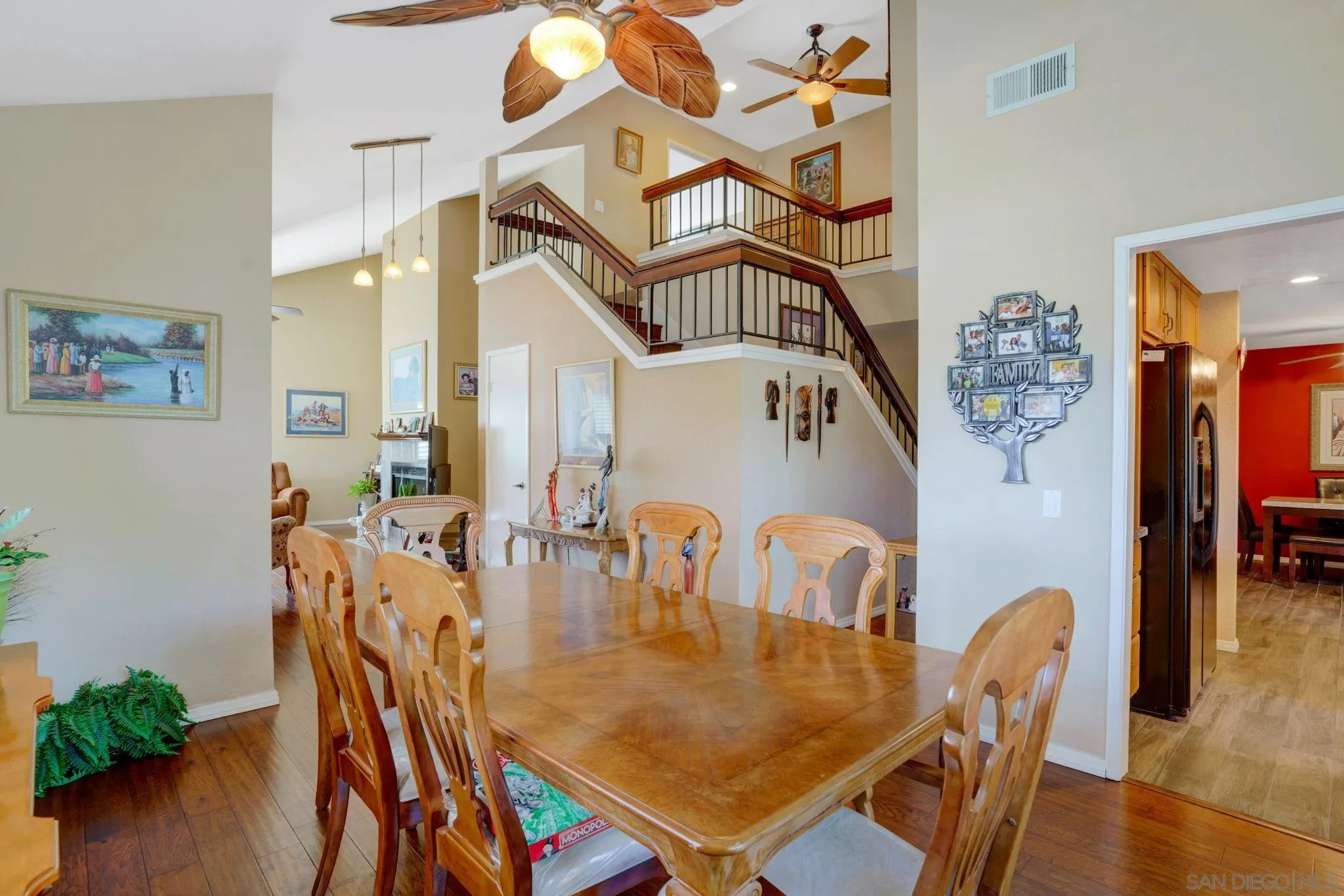 3006 Gayla Court Spring Valley, CA 91978 - Photo 10 of 39 a dining room with furniture and wooden floor