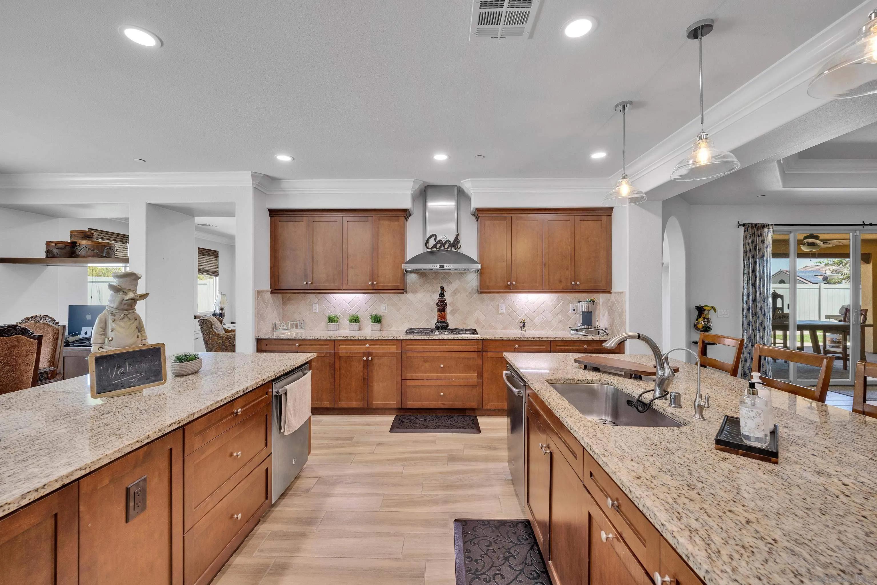5620 Rancho Del Caballo Bonsall, CA 92003 - Photo 18 of 62 a kitchen with lots of counter space sink and appliances