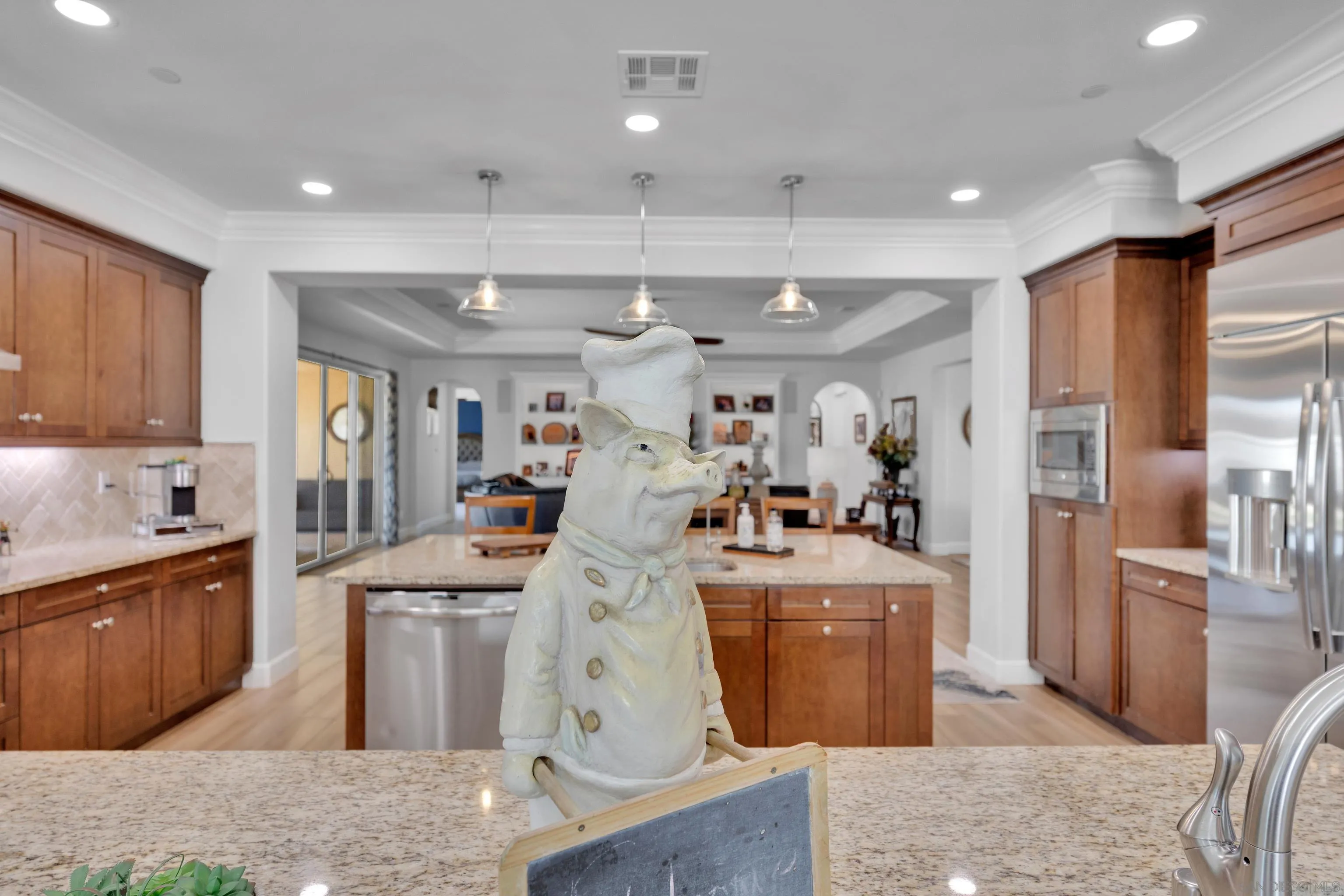 5620 Rancho Del Caballo Bonsall, CA 92003 - Photo 19 of 62 a large kitchen with stainless steel appliances granite countertop a large counter top and a stove