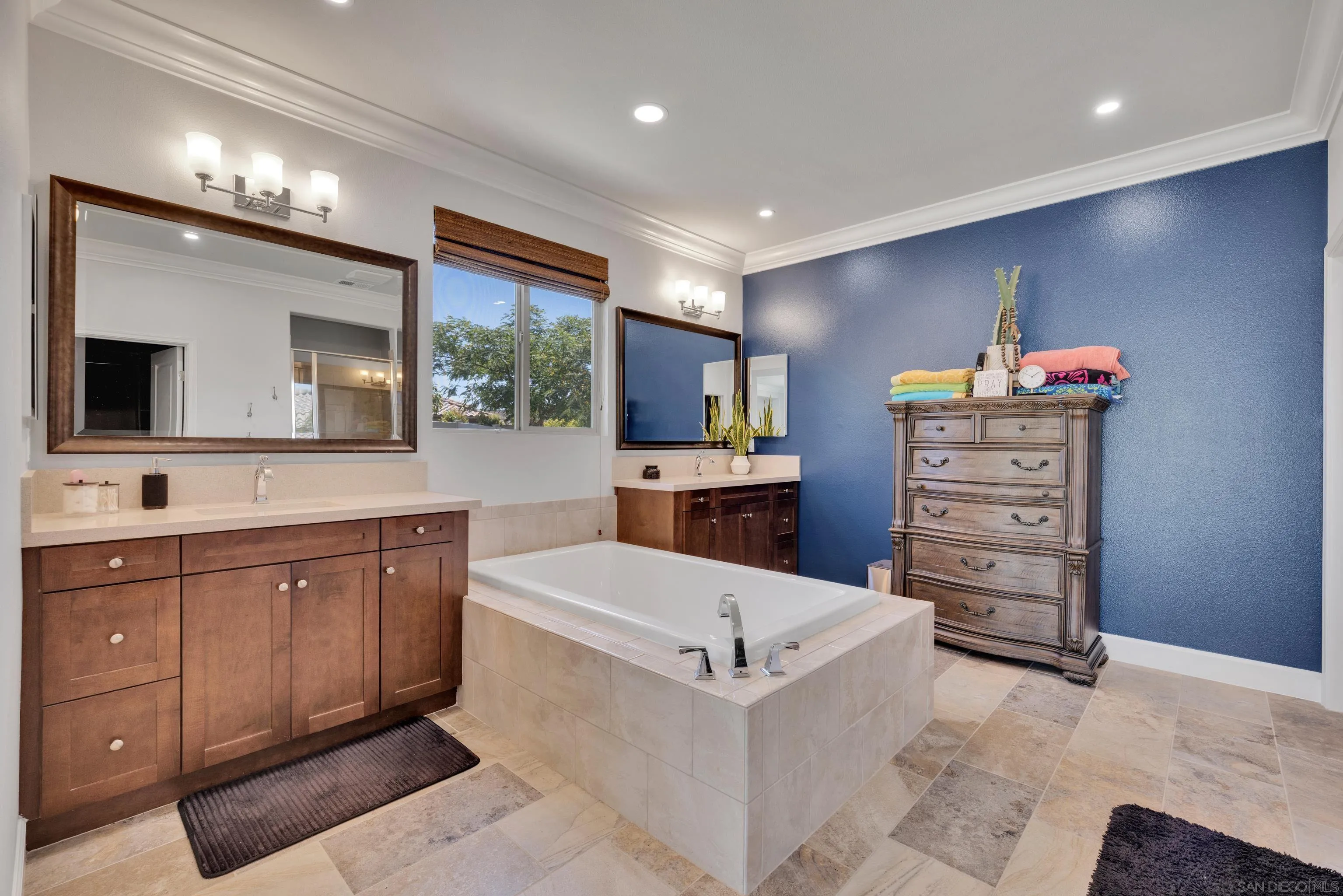 5620 Rancho Del Caballo Bonsall, CA 92003 - Photo 33 of 62 a large spacious bathroom with a double vanity sink a large mirror and a bathtub