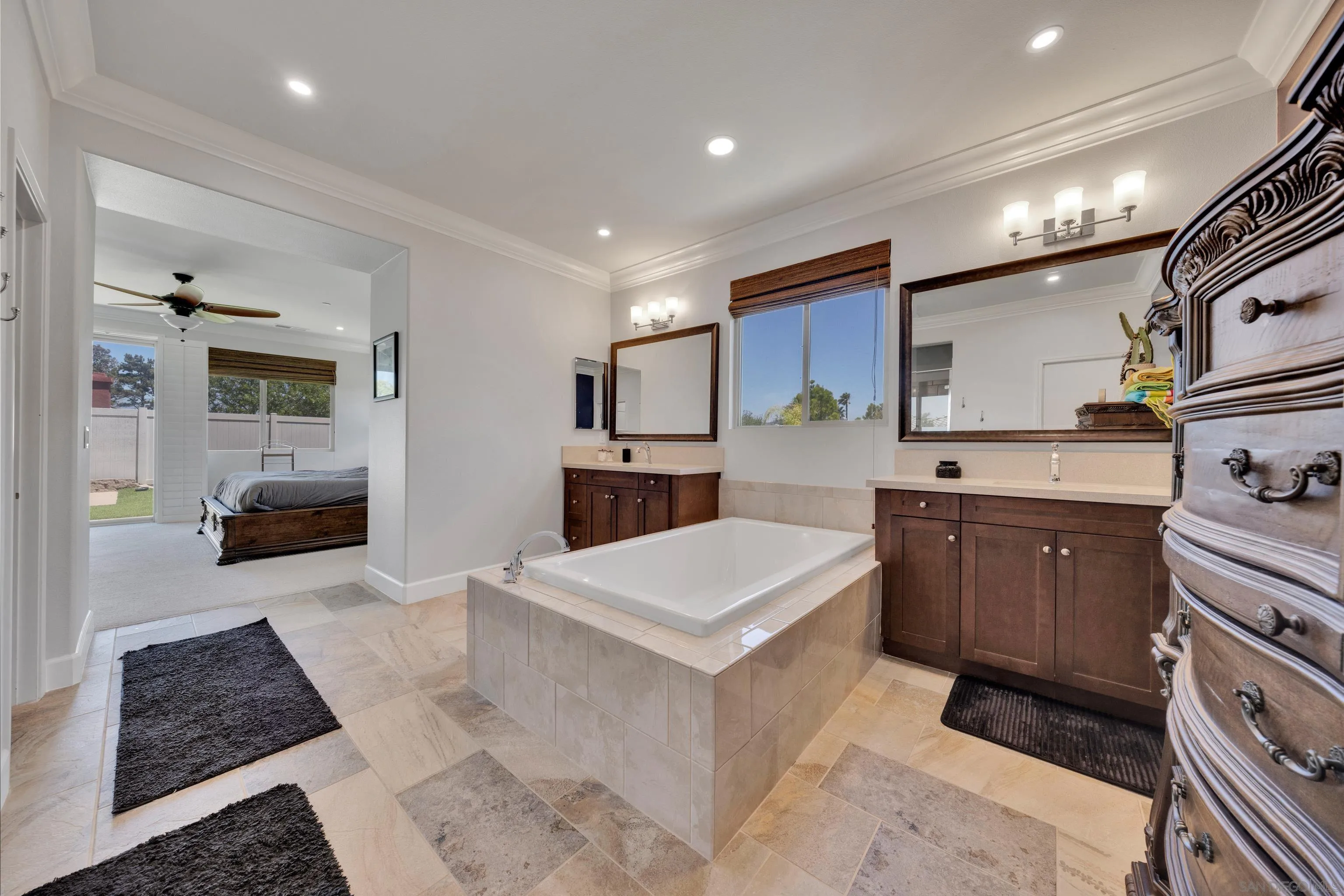 5620 Rancho Del Caballo Bonsall, CA 92003 - Photo 35 of 62 a large white kitchen with stainless steel appliances granite countertop a sink and cabinets