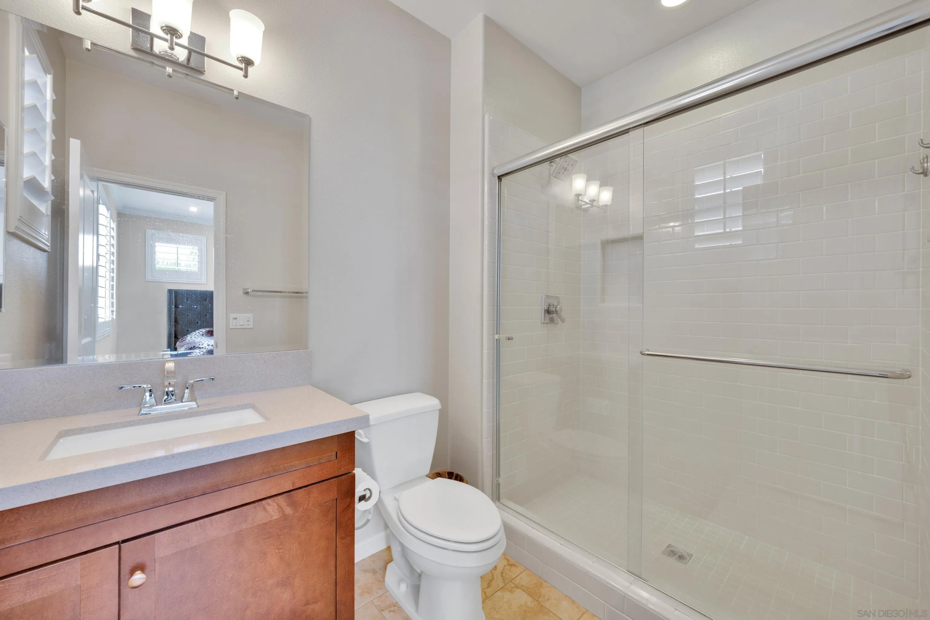 5620 Rancho Del Caballo Bonsall, CA 92003 - Photo 49 of 62 a bathroom with a sink a toilet and shower