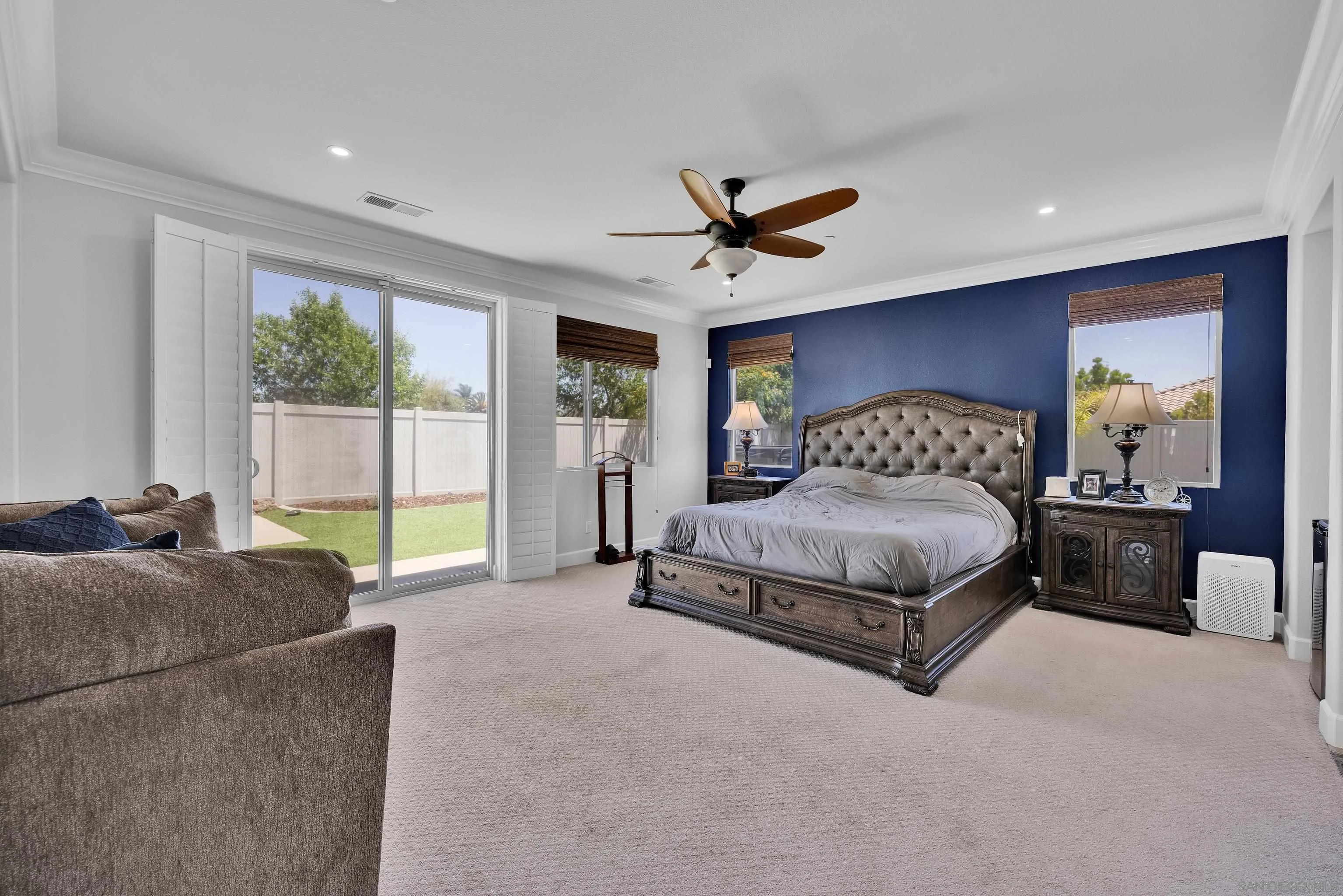 5620 Rancho Del Caballo Bonsall, CA 92003 - Photo 5 of 62 a bedroom with a large bed and a large window