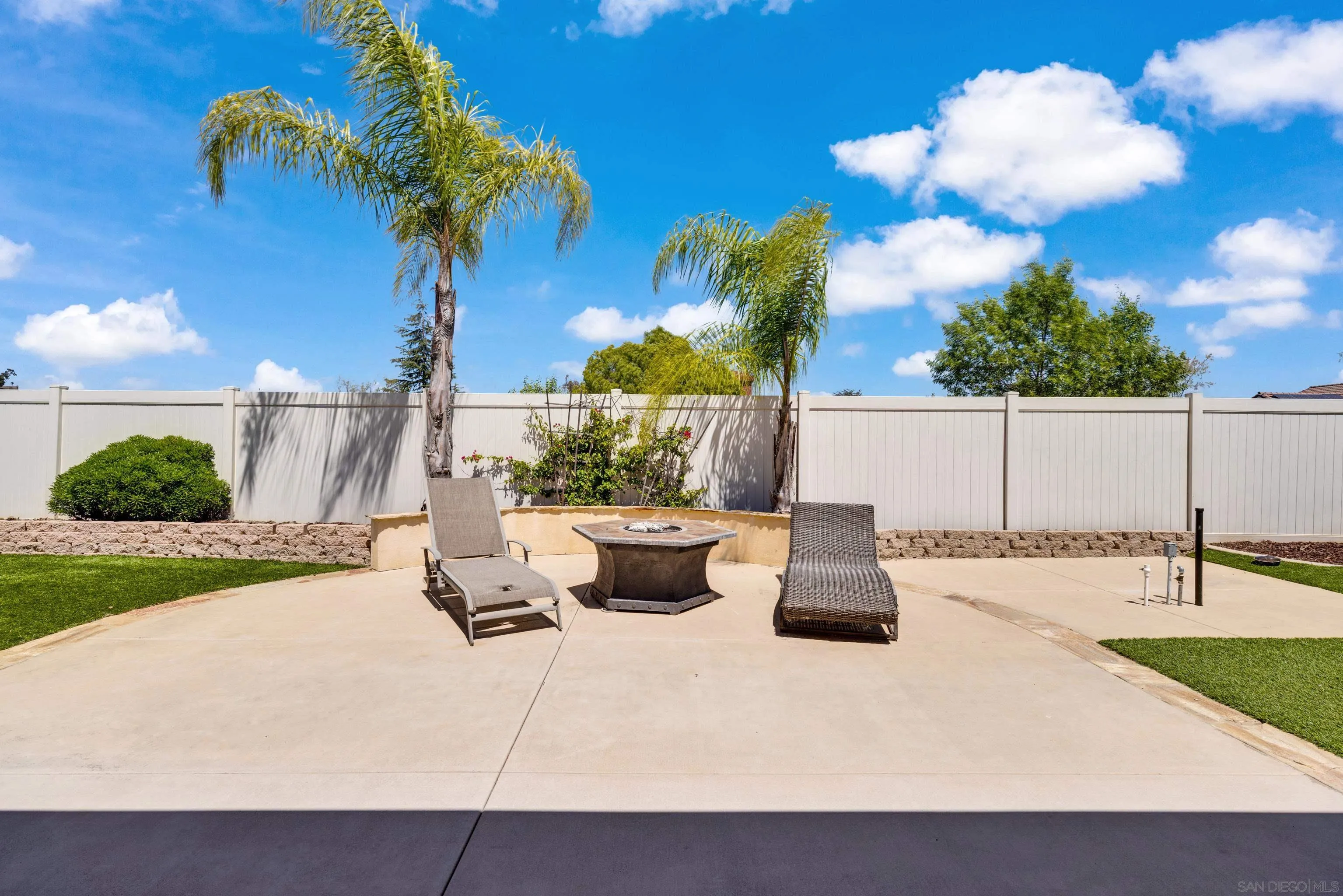 5620 Rancho Del Caballo Bonsall, CA 92003 - Photo 53 of 62 a view of a patio with couches and potted plants