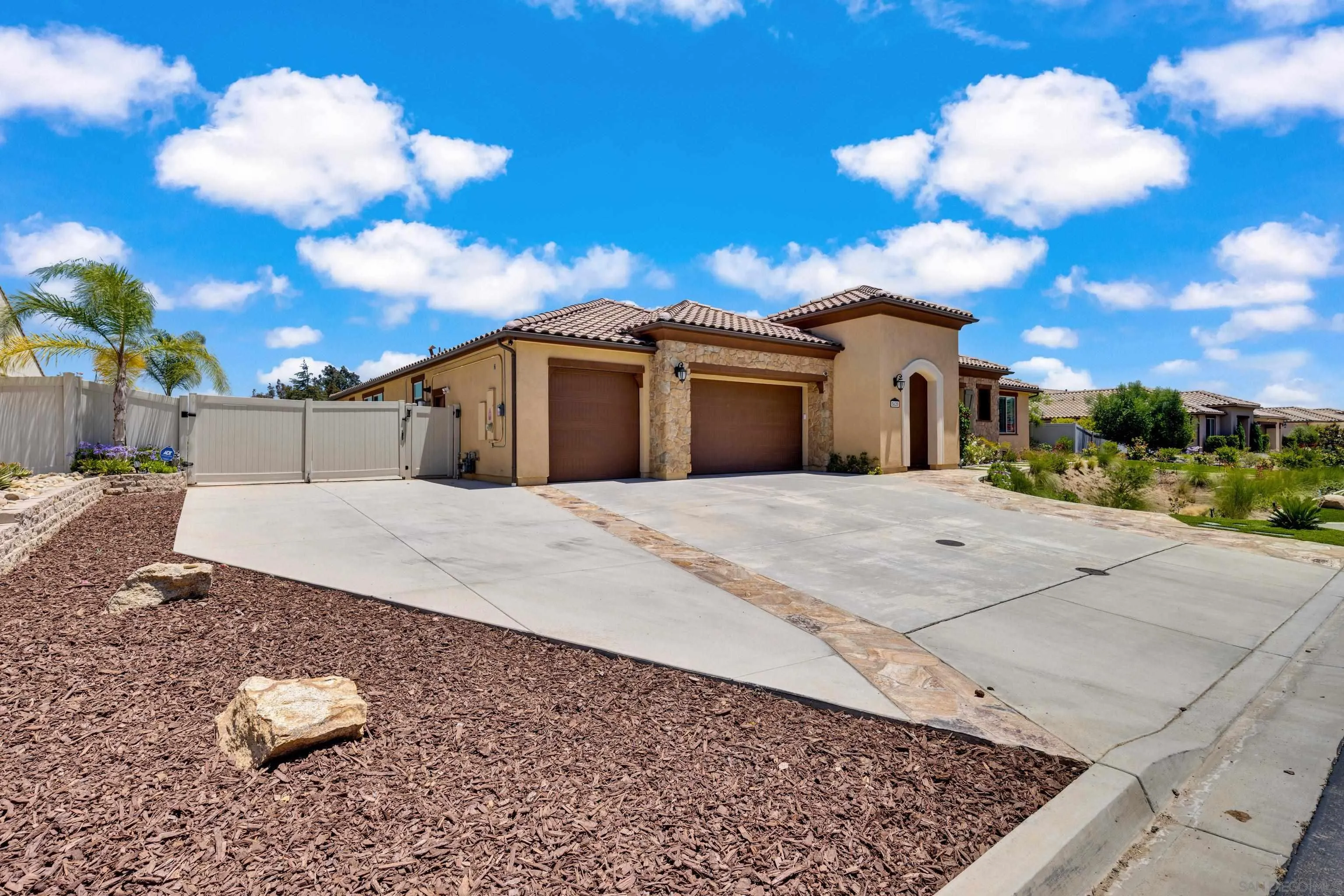 5620 Rancho Del Caballo Bonsall, CA 92003 - Photo 7 of 62 a view of a house with a yard