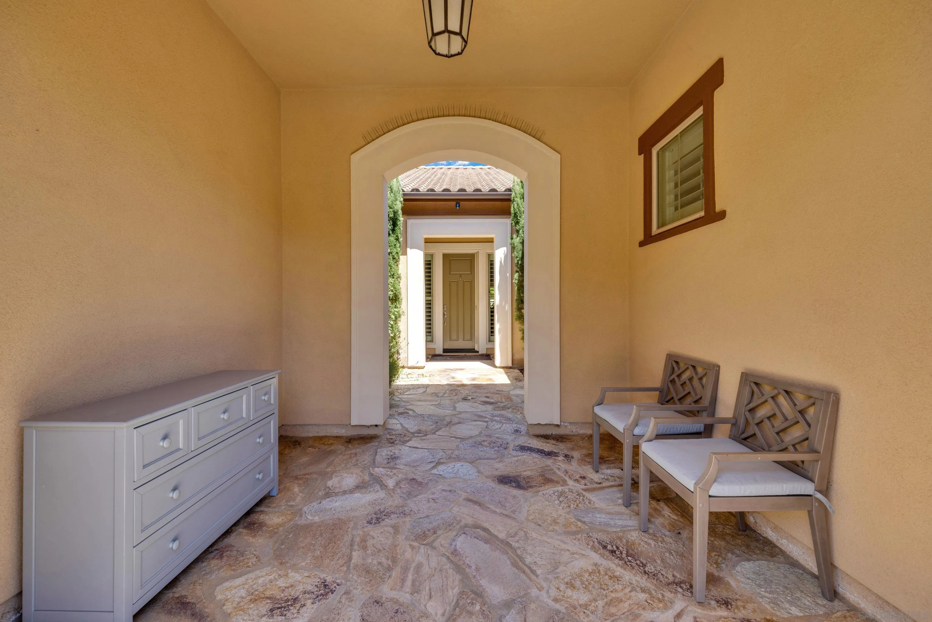 5620 Rancho Del Caballo Bonsall, CA 92003 - Photo 9 of 62 a living room with furniture and a window