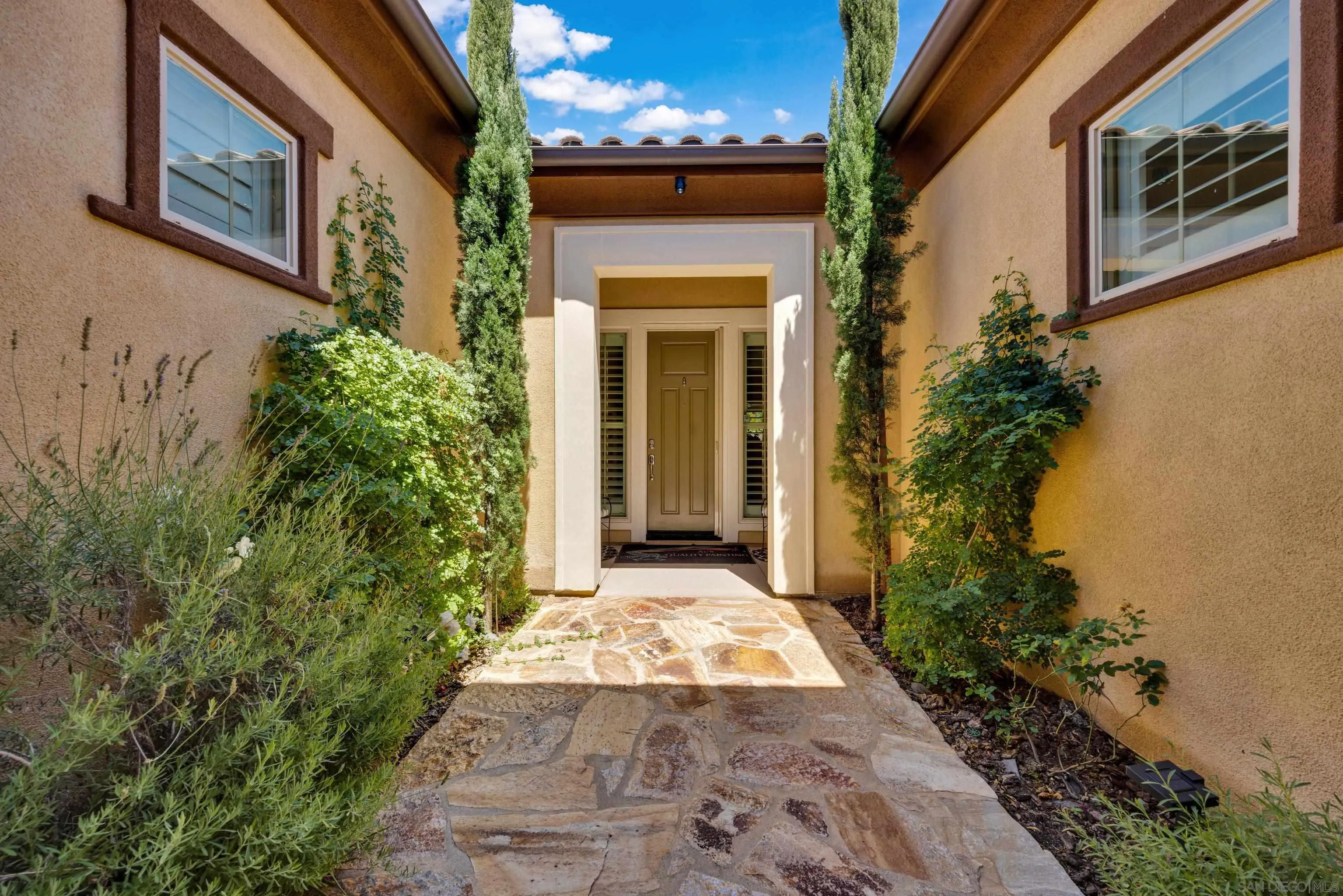 5620 Rancho Del Caballo Bonsall, CA 92003 - Photo 10 of 62 a front view of a house with a yard