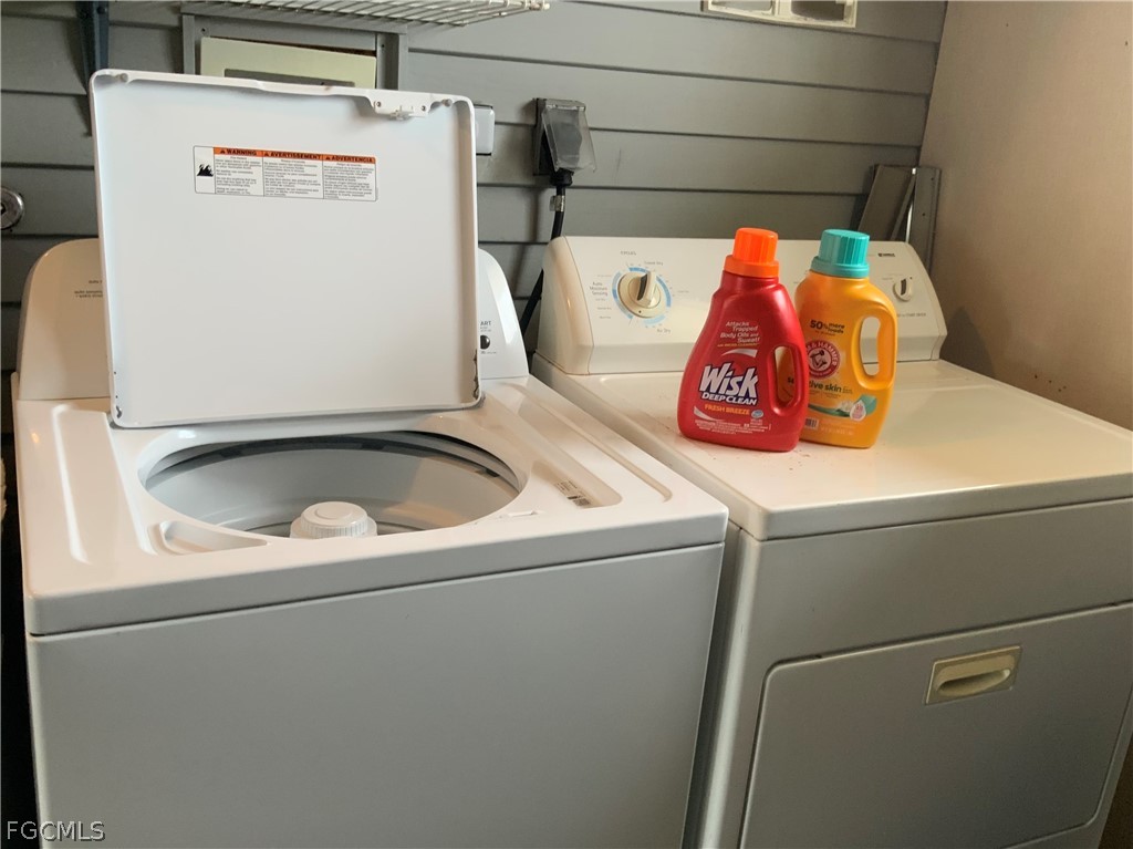 15550 Burnt Store Road, Unit 89 Punta Gorda, FL 33955 - Photo 15 of 28 a utility room with dryer and washer