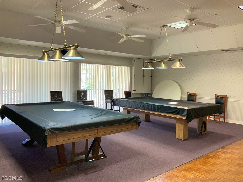 15550 Burnt Store Road, Unit 89 Punta Gorda, FL 33955 - Photo 16 of 28 a room with furniture pool table and windows