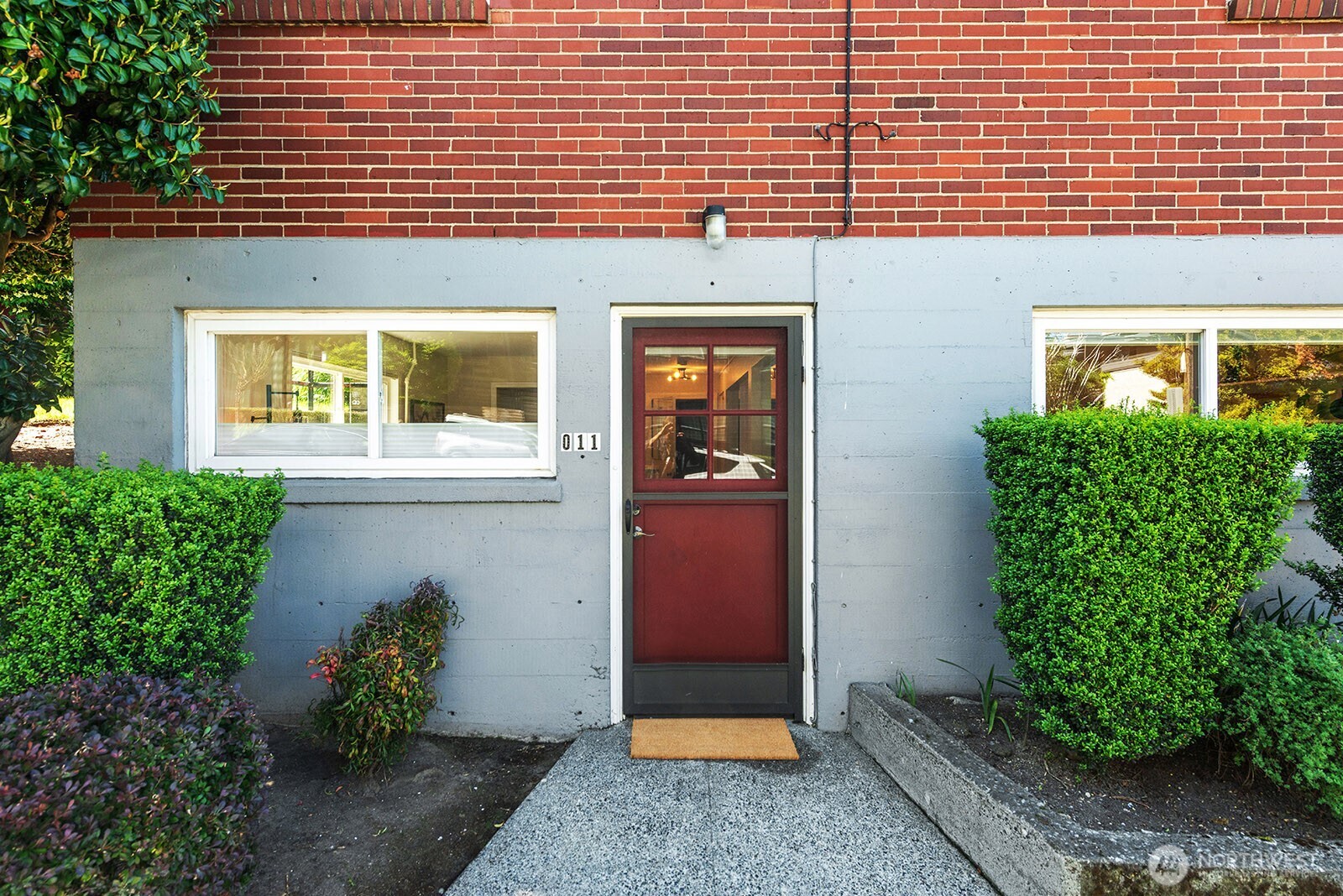 4407 Southwest Alaska Street, Unit 11 Seattle, WA 98116 - Photo 17 of 24 a front view of a house