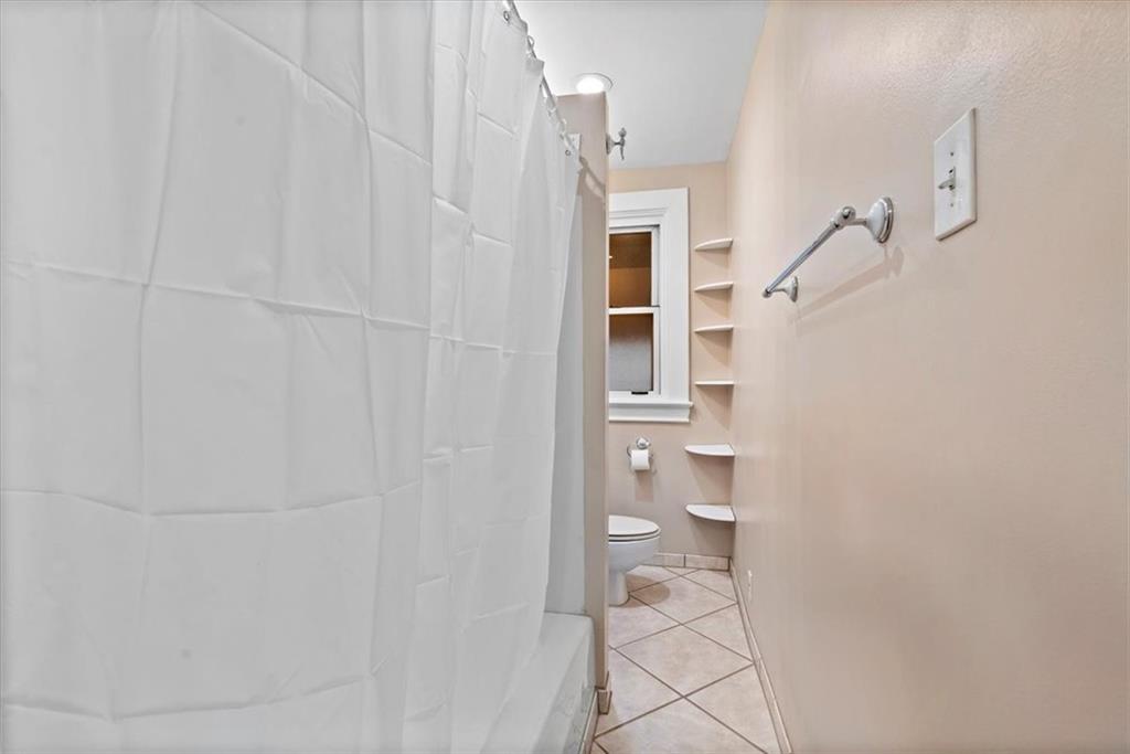 1140 Race Street McKees Rocks, PA 15136 - Photo 16 of 25 a bathroom with a shower and a toilet