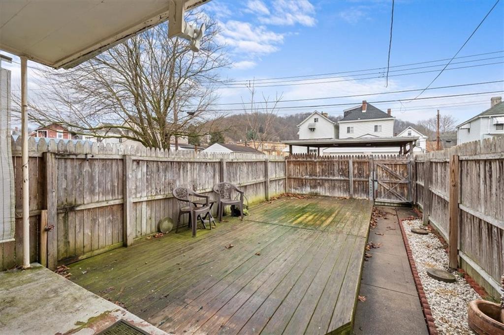 1140 Race Street McKees Rocks, PA 15136 - Photo 22 of 25 a view of a balcony with wooden floor