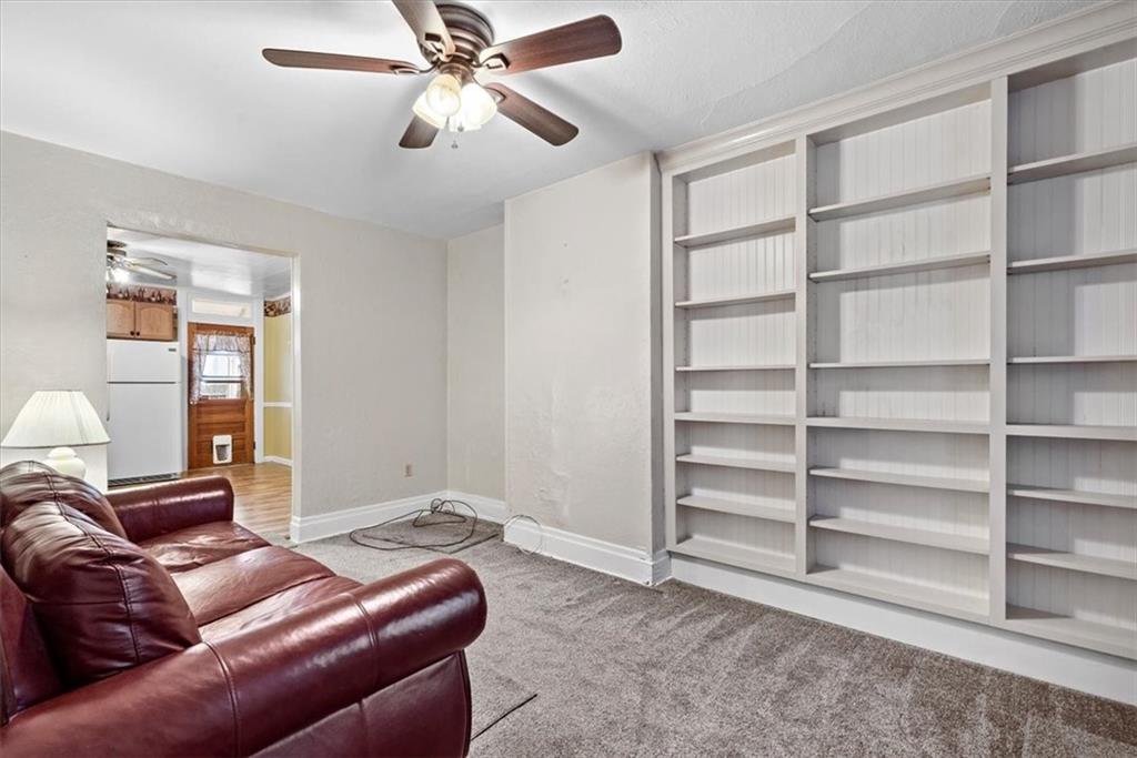 1140 Race Street McKees Rocks, PA 15136 - Photo 5 of 25 a living room with furniture and a window
