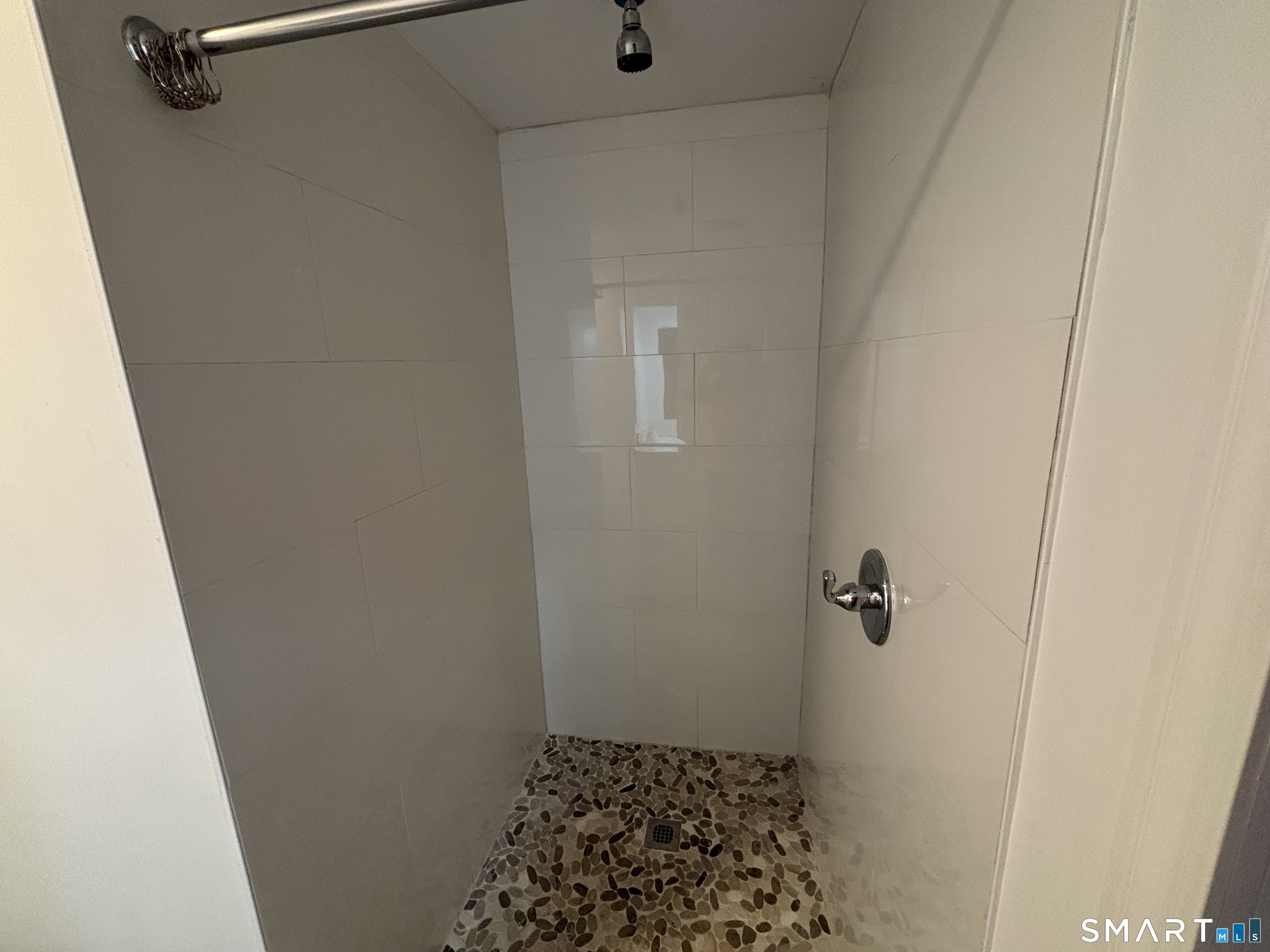 76 Cannon Street Hamden, CT 06518 - Photo 6 of 9 a bathroom with a shower