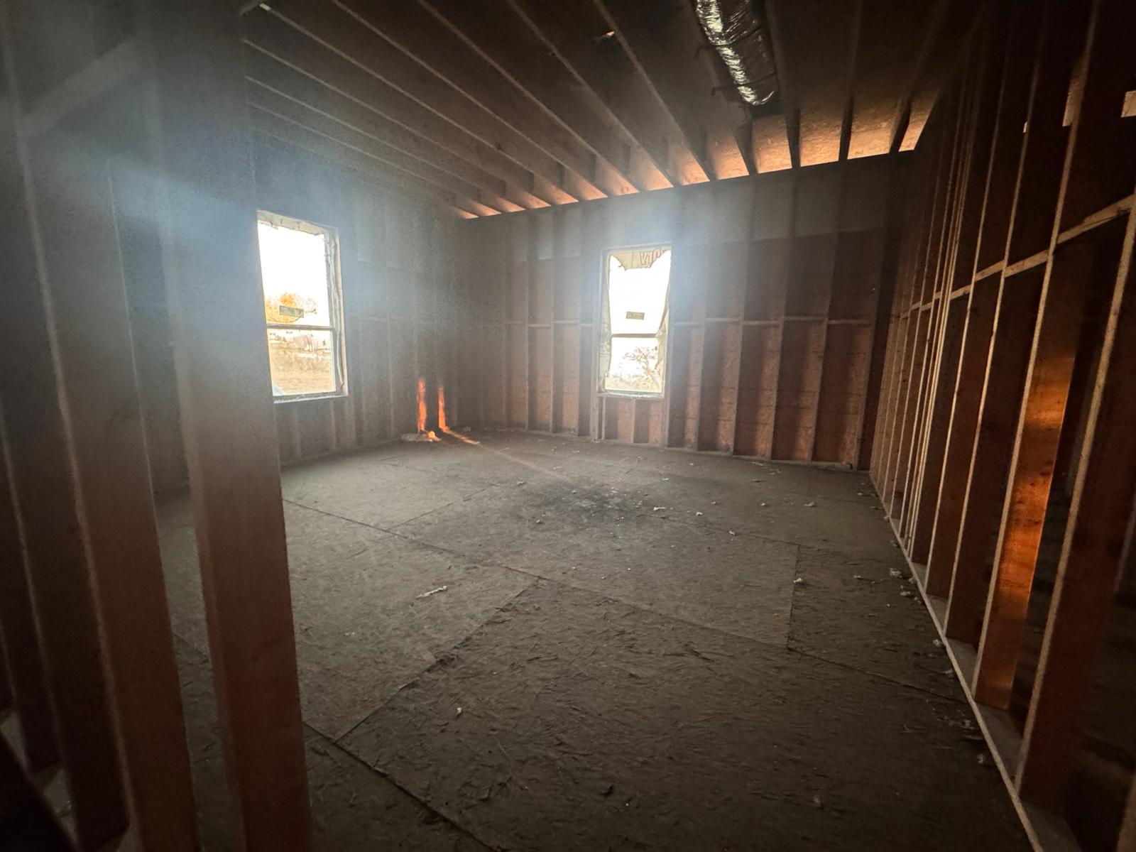 Tbd Jones Road Cedar Creek, TX 78612 - Photo 21 of 34 a view of empty room with wooden floor and fan