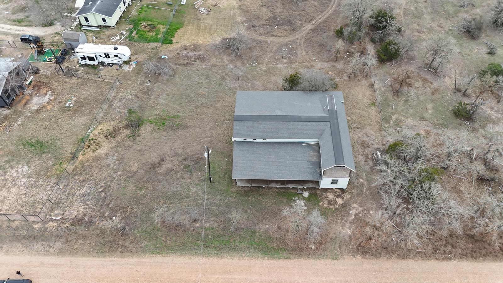 Tbd Jones Road Cedar Creek, TX 78612 - Photo 5 of 34 a front view of a house with a yard