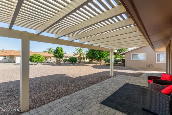 a view of a backyard of the house