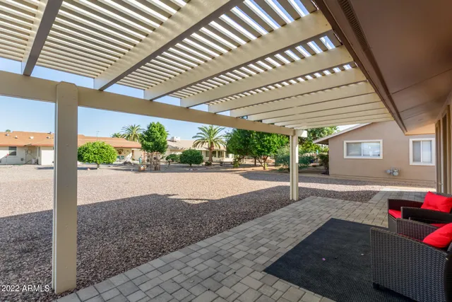 a view of a backyard of the house