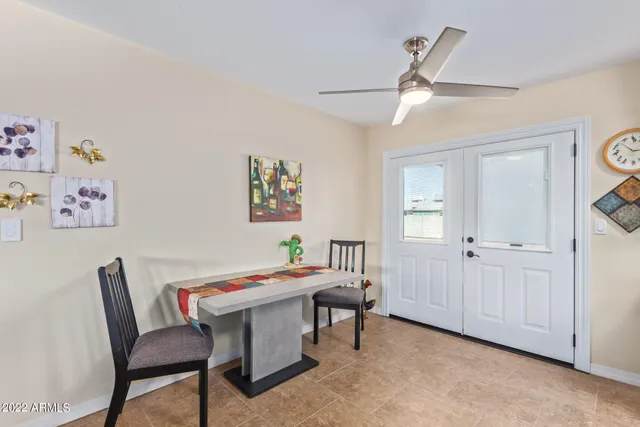 a workspace with furniture and window