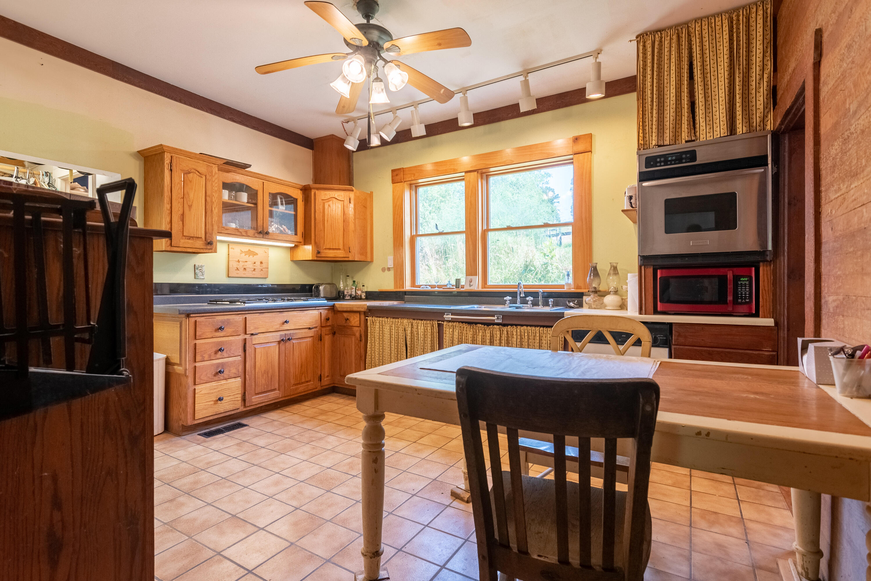 415 Reed Hill Road Northwest Floyd, VA 24091 - Photo 22 of 69 a kitchen with granite countertop a sink appliances and cabinets