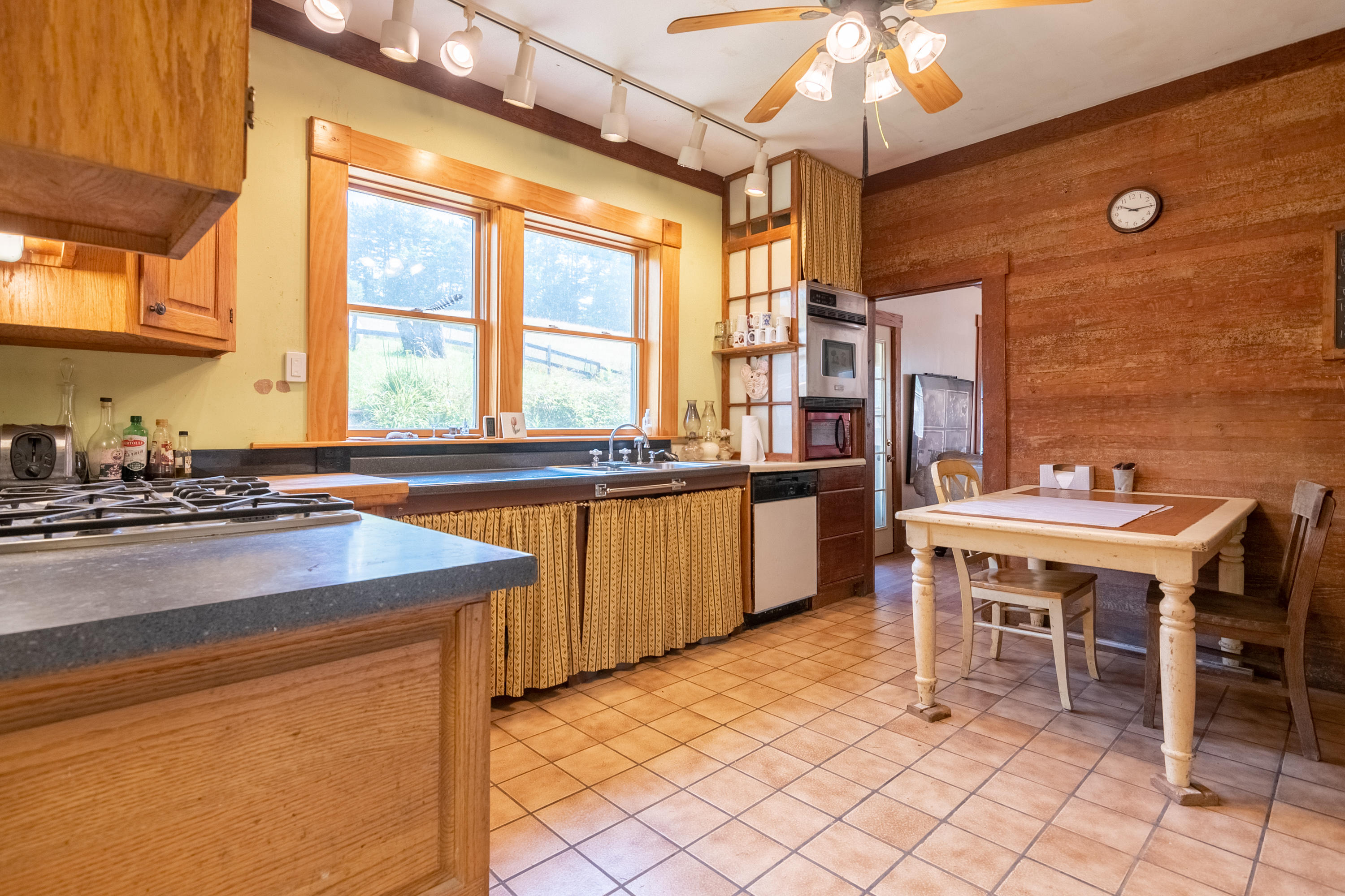 415 Reed Hill Road Northwest Floyd, VA 24091 - Photo 23 of 69 a kitchen with granite countertop a sink and a stove