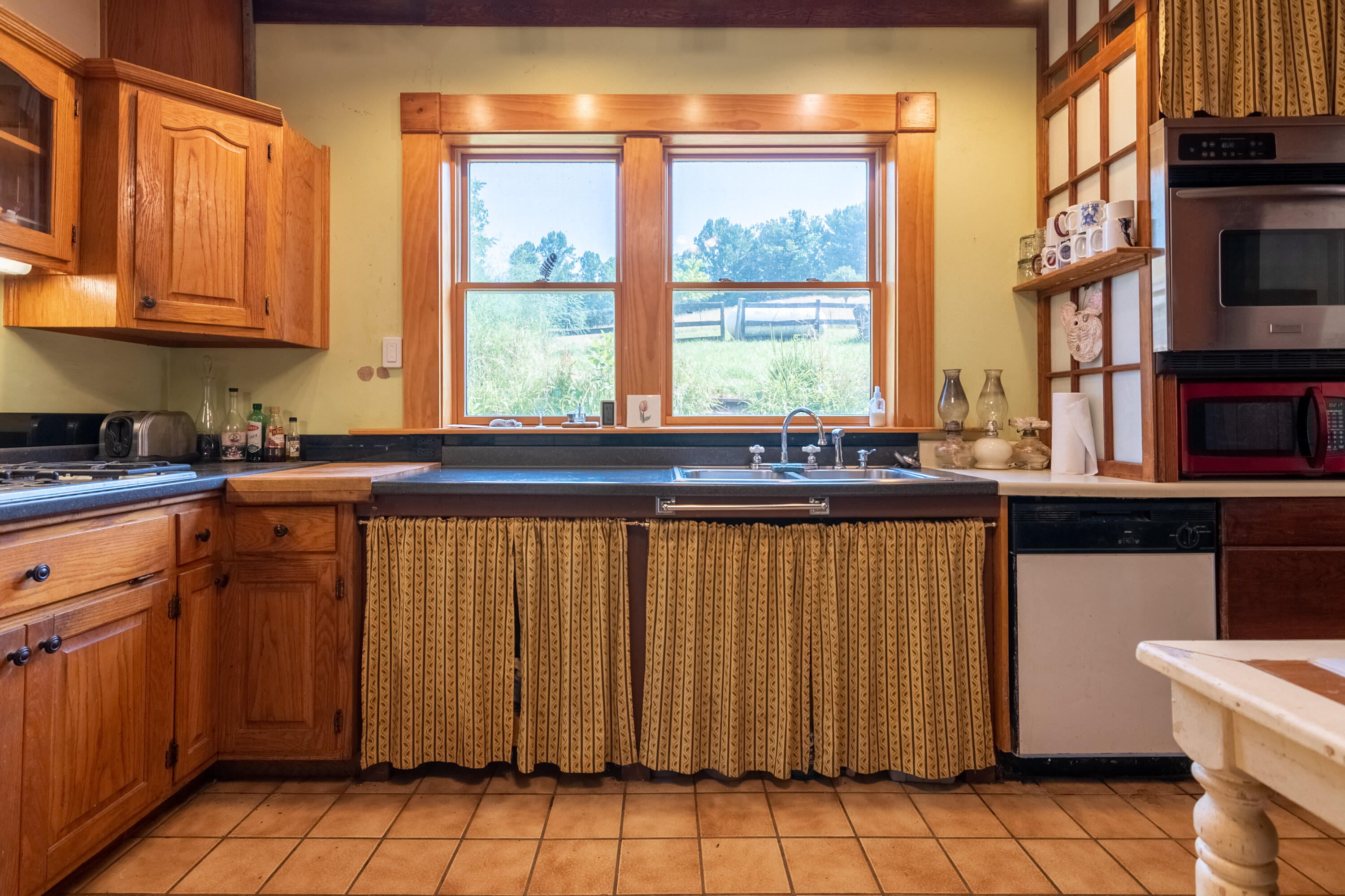 415 Reed Hill Road Northwest Floyd, VA 24091 - Photo 24 of 69 a kitchen with stainless steel appliances a sink and cabinets