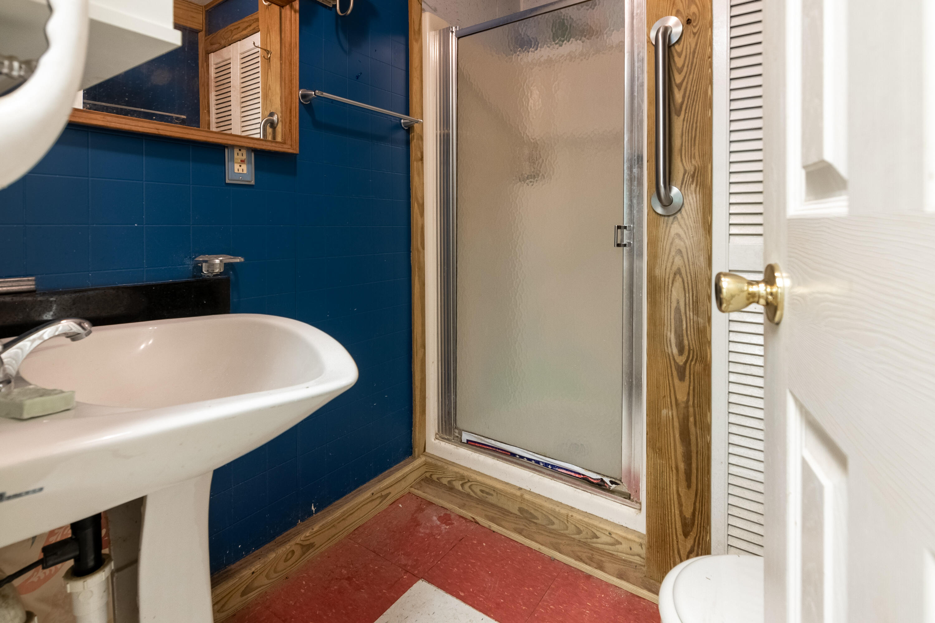 415 Reed Hill Road Northwest Floyd, VA 24091 - Photo 30 of 69 a bathroom with a sink and a mirror