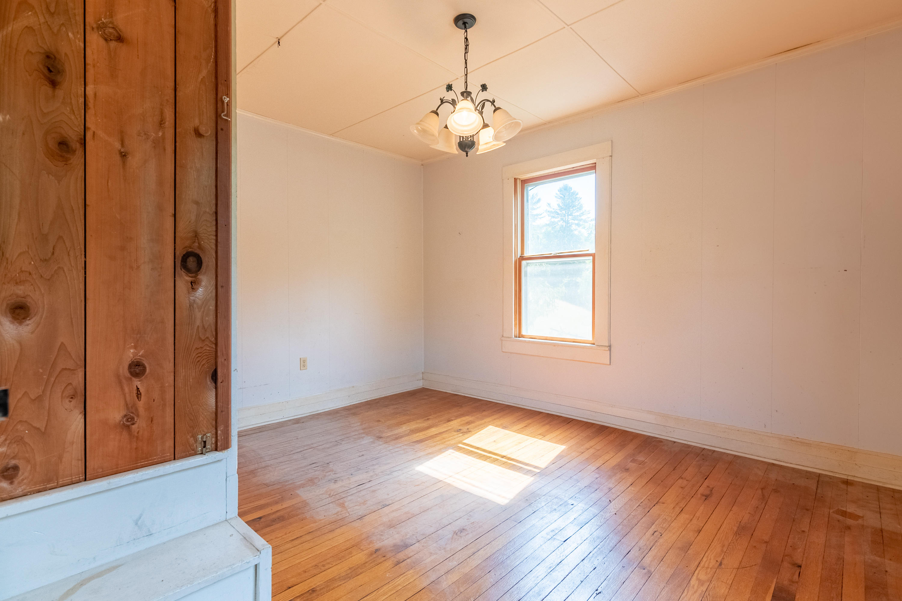 415 Reed Hill Road Northwest Floyd, VA 24091 - Photo 47 of 69 a view of empty room with wooden floor and fan