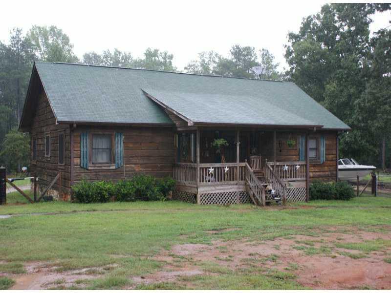 230 Wallis Road Villa Rica, GA 30180 - Photo 1 of 1 a view of house with backyard