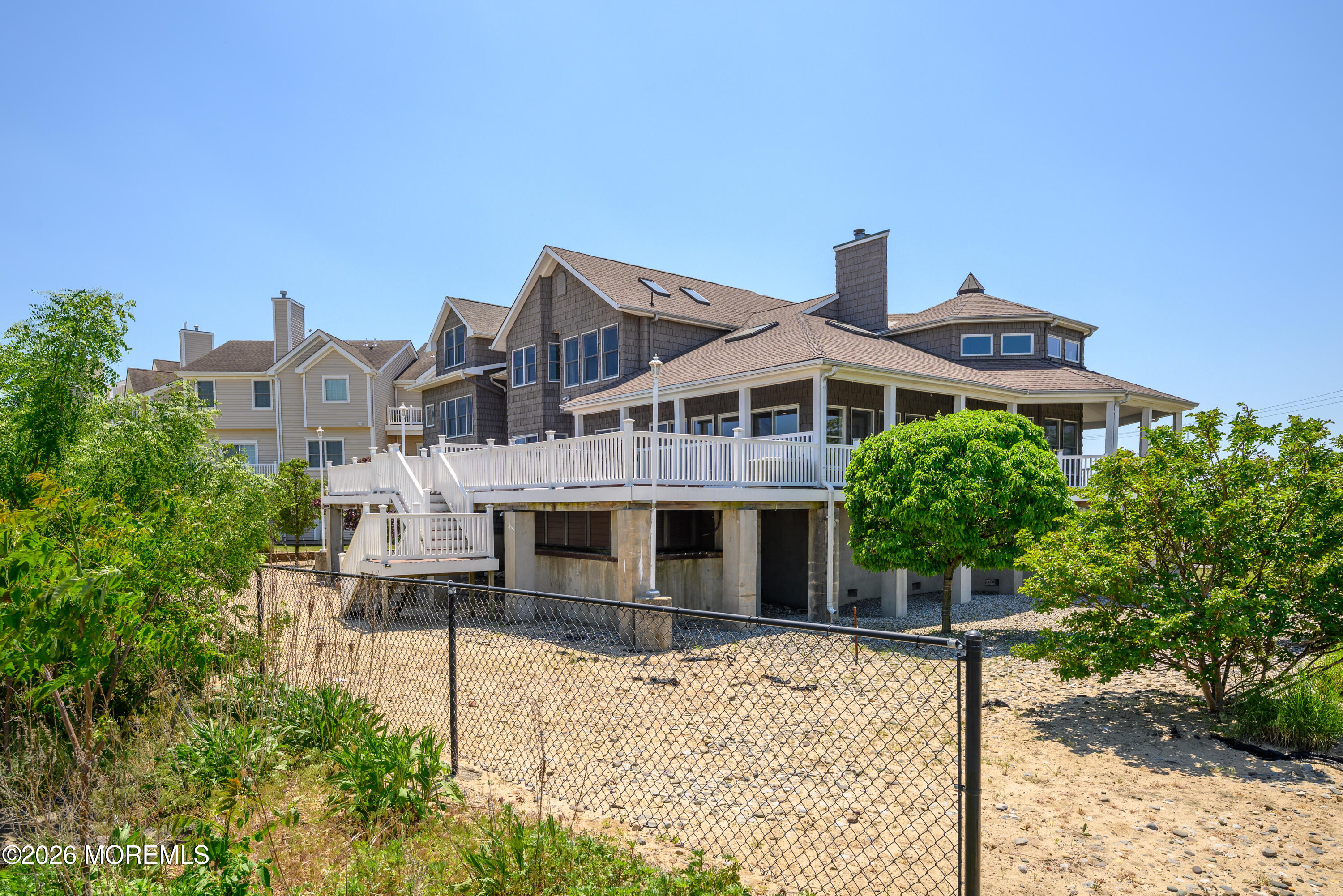 805 Front Street Union Beach, NJ 07735 - Photo 45 of 65 a front view of a house with a yard