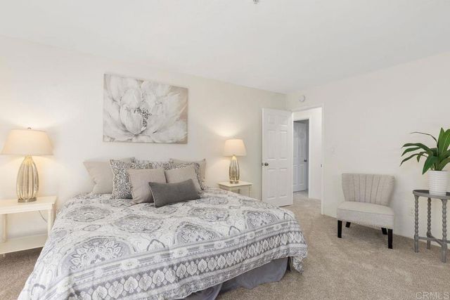 a bathroom with a shower and a bath tub