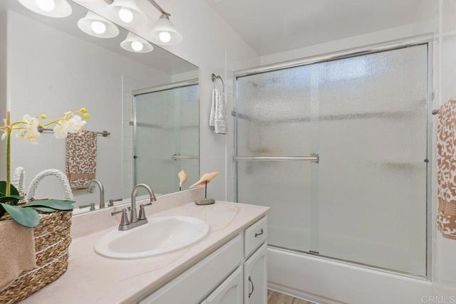 a view of a balcony with a potted plant