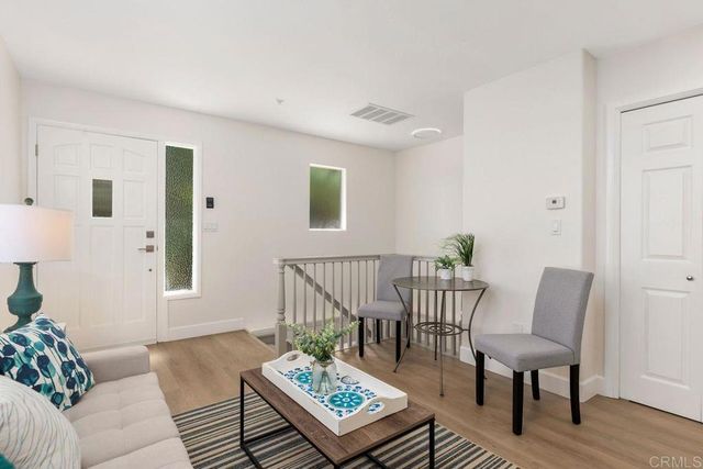 a stove top oven sitting inside of a kitchen