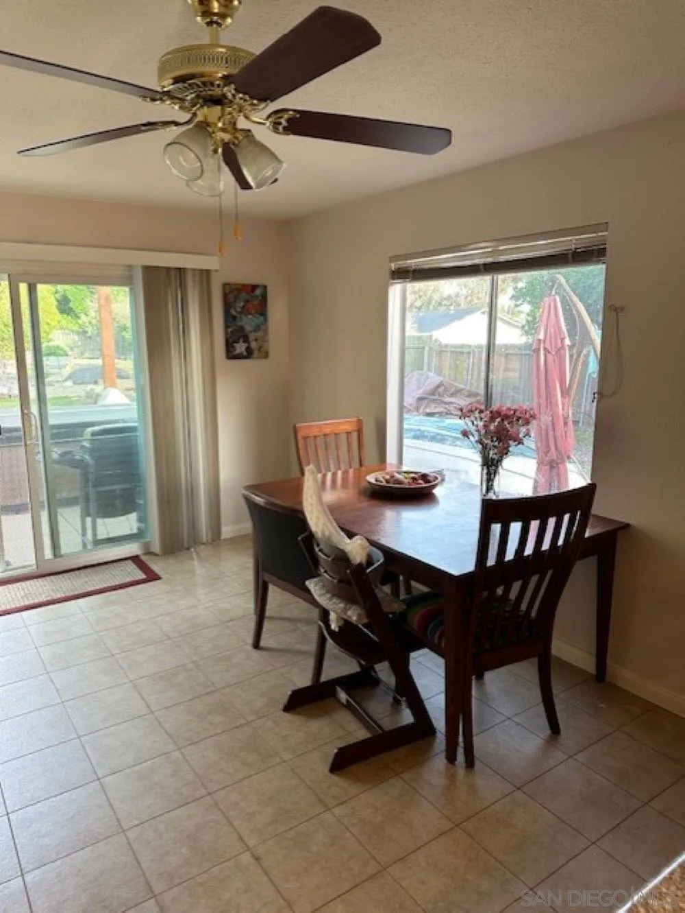 3554 Evening Canyon Road Oceanside, CA 92056 - Photo 7 of 14 a view of a dining room with furniture window and outside view