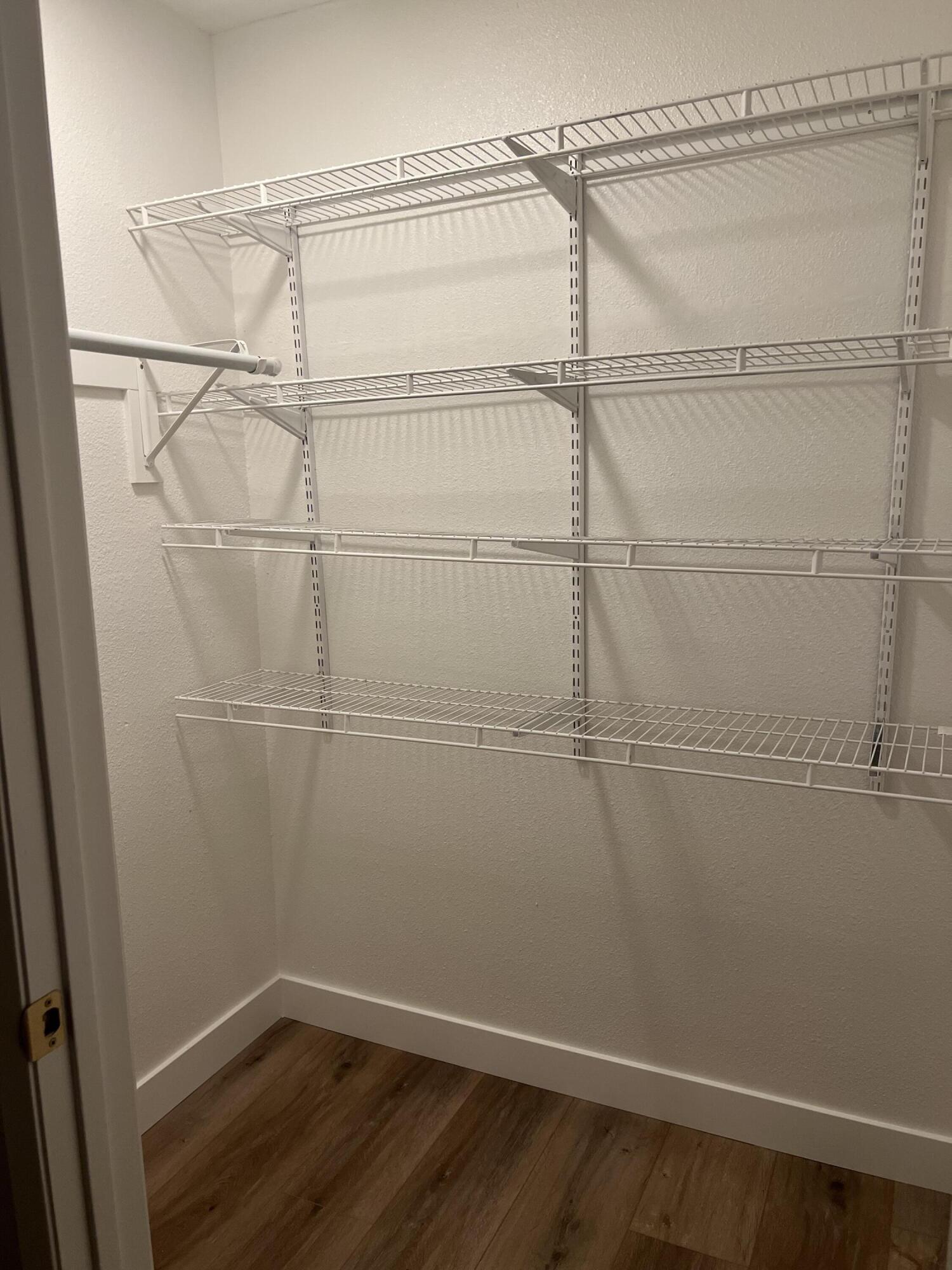 79307 South Sunset Ridge Drive La Quinta, CA 92253 - Photo 16 of 32 a view of a room with racks on the wall