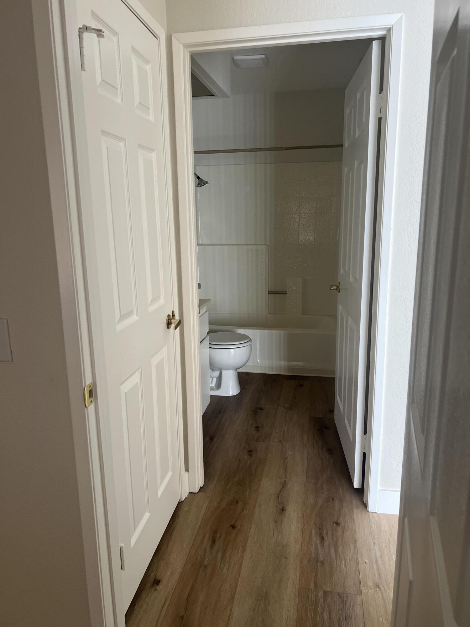 79307 South Sunset Ridge Drive La Quinta, CA 92253 - Photo 20 of 32 a bathroom with a toilet