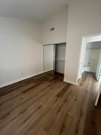 a view of a hallway view with staircase
