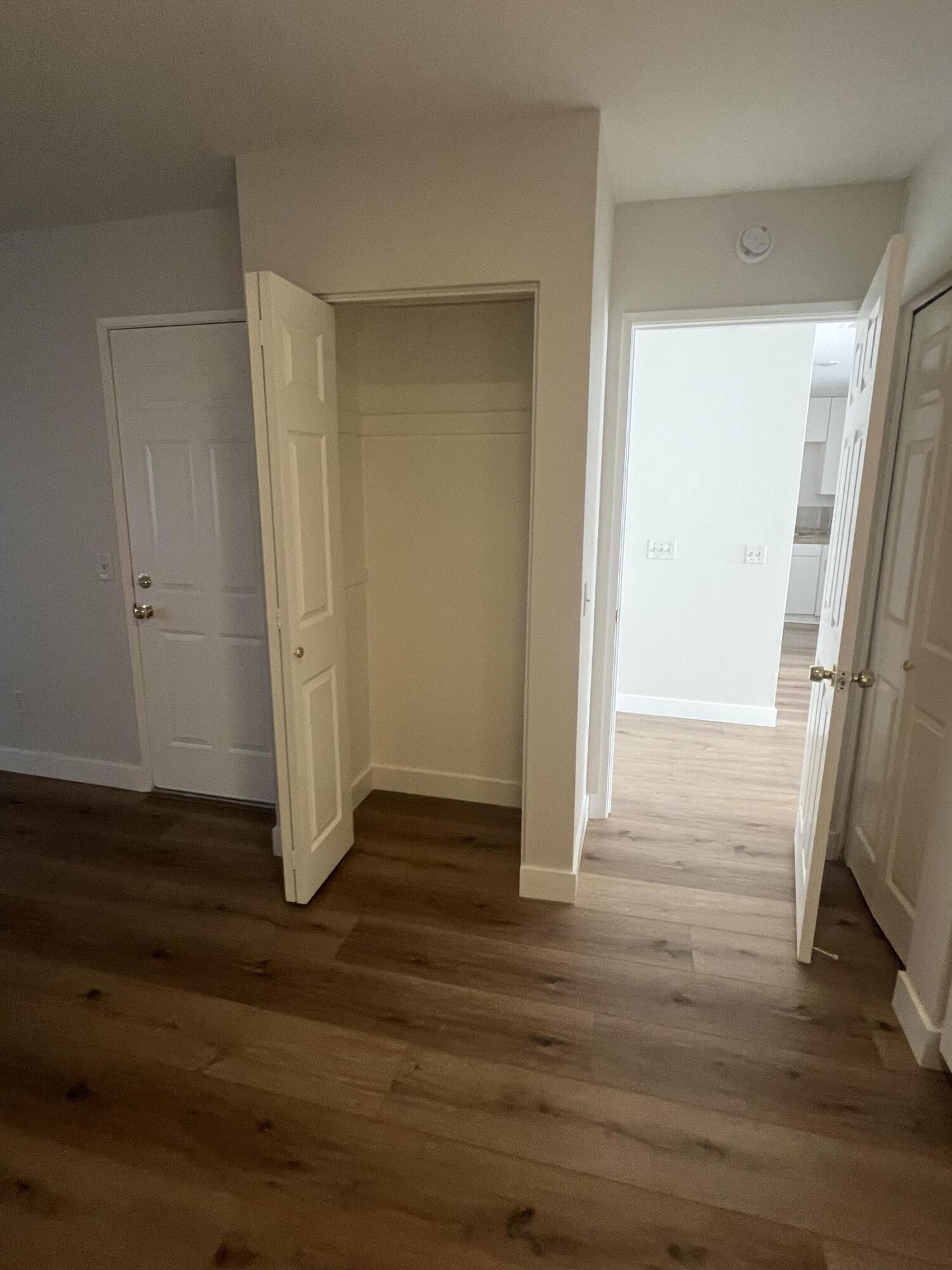 79307 South Sunset Ridge Drive La Quinta, CA 92253 - Photo 26 of 32 a view of wooden floor in an empty room