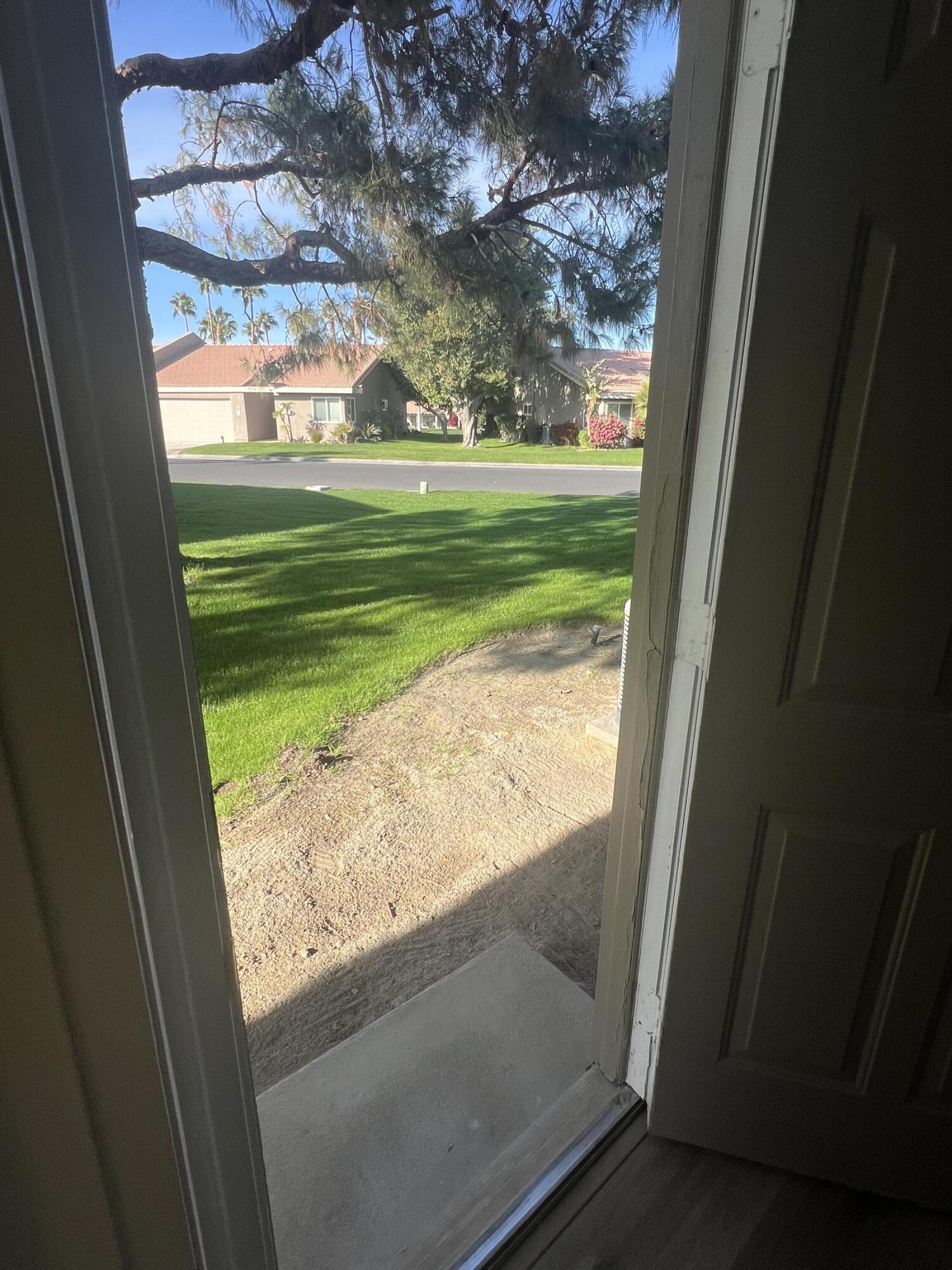 79307 South Sunset Ridge Drive La Quinta, CA 92253 - Photo 30 of 32 a view of a room and a lake view